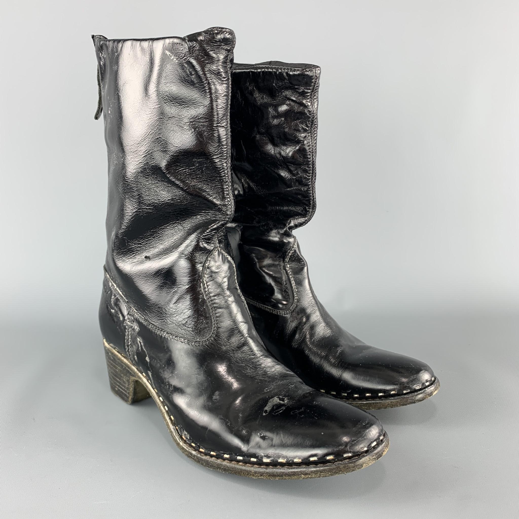 PREMIATA boots come in distressed black patent leather with a stacked heel sole and back zip closure.  Made in Italy.

Good Pre-Owned Condition.
Marked: IT 38

Heel: 2.25 in.
Length: 9 in.