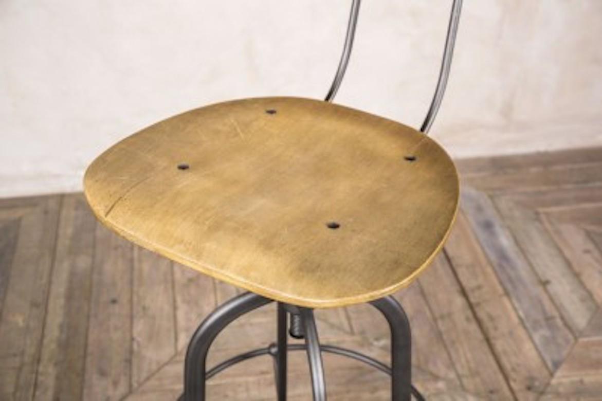 A fine Premier Industrial barstool with back, 20th century.

A fantastic addition to our cutting-edge range of urban warehouse furniture, these vintage and industrial style machinist stools are new to the market and very much in vogue.

These