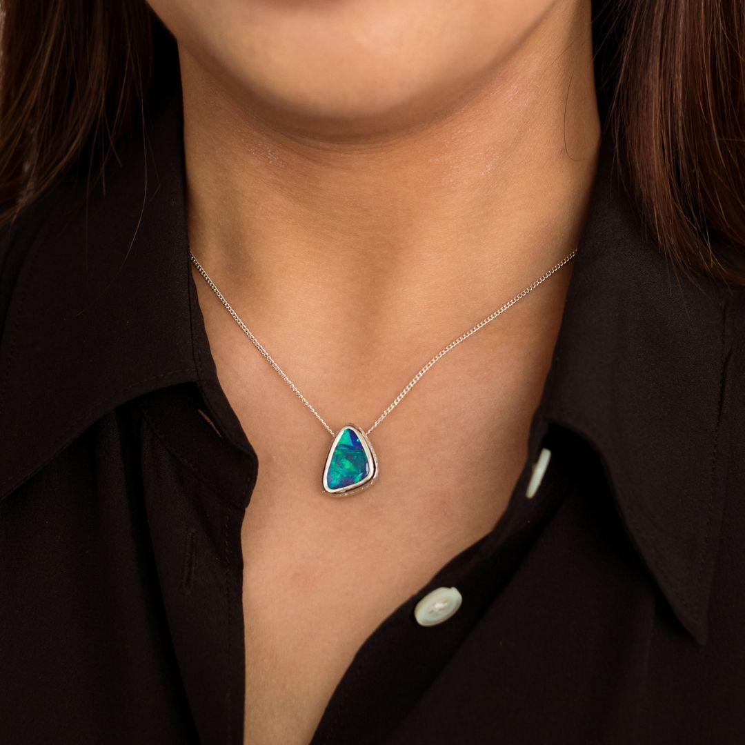 Utterly divine, the ‘Above The Clouds’ opal pendant features a stunning black opal (2.45ct) sourced from renowned mines in Lightning Ridge, Australia. Perfectly crafted in gorgeous 18K white gold with a surprising row of 35 sparkling diamonds