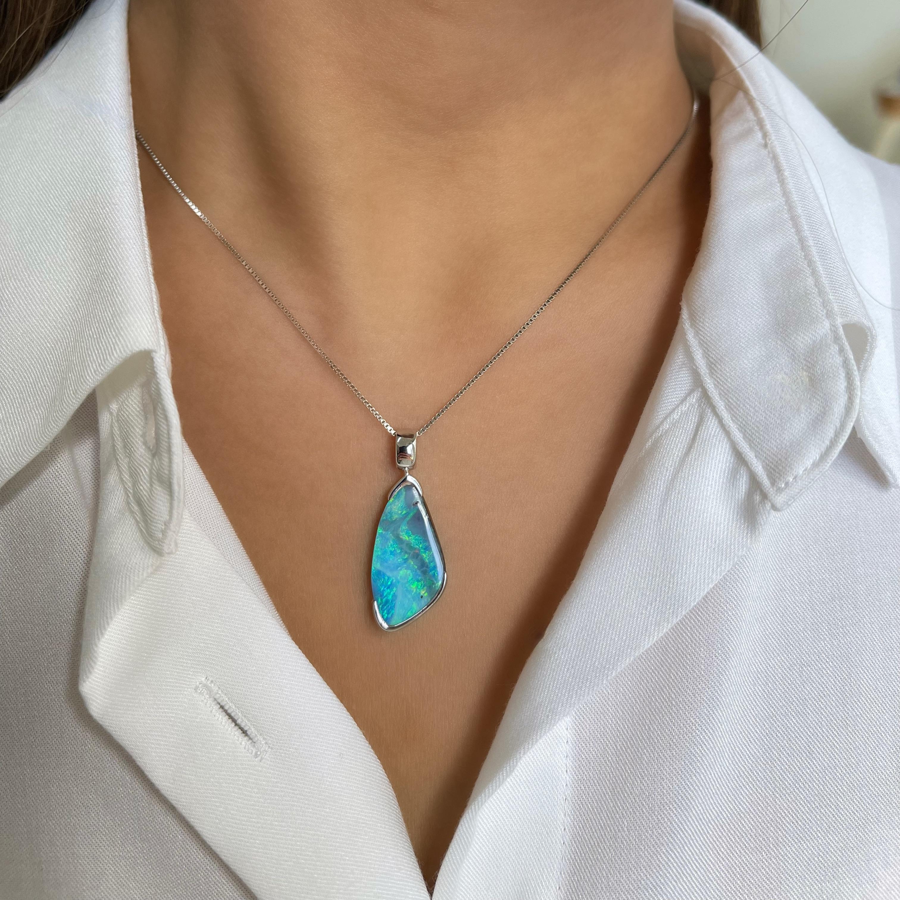 ‘Marissa’ opal pendant features a stylish boulder opal (2.96ct) ethically sourced from Winton opal mines in Australia, bound to inspire awe and admiration. Masterfully set in our elegant 18 karats white gold, the intriguing turquoise and green opal