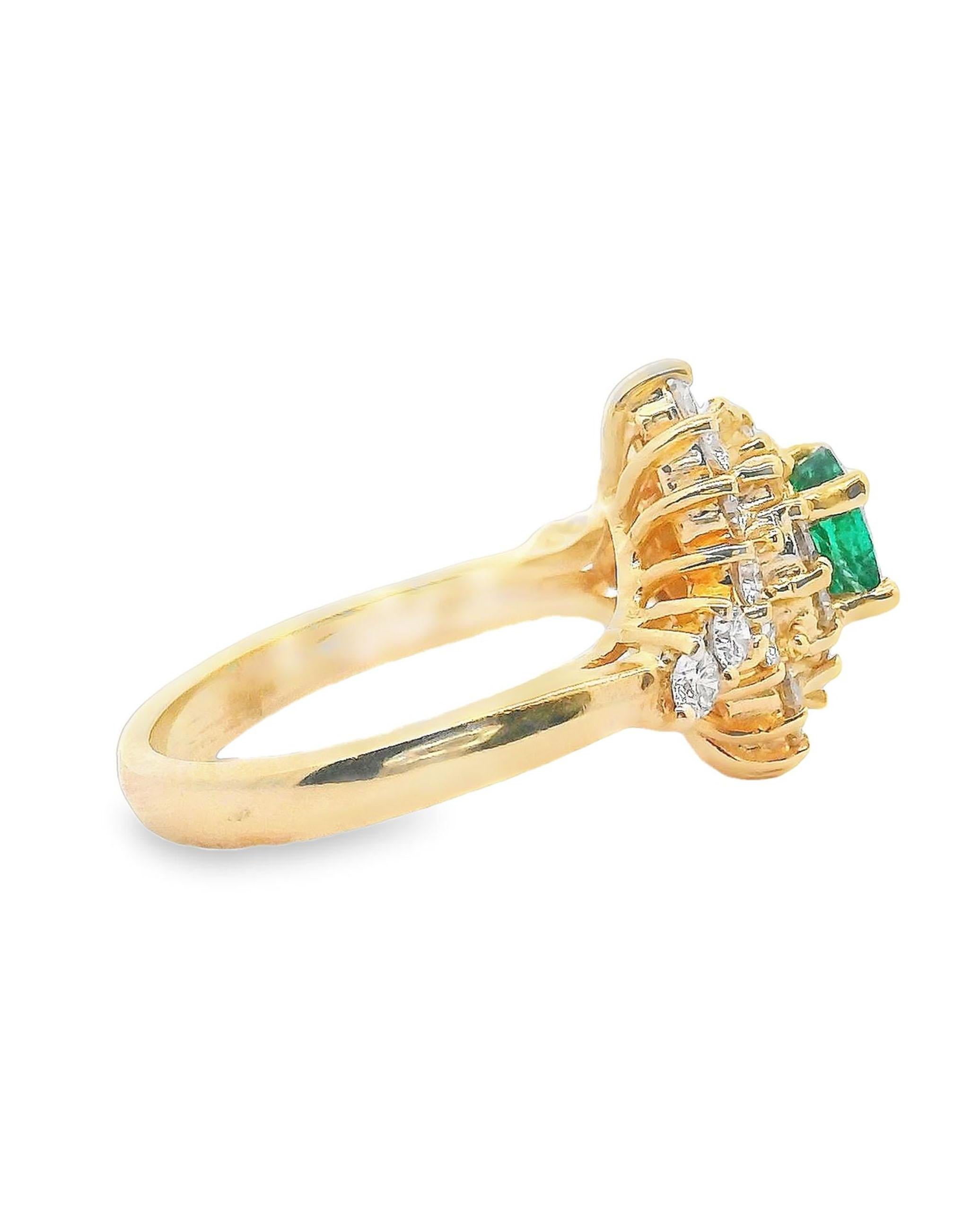 Preowned 14K yellow gold ring with 28 round brilliant-cut diamonds weighing approximately 1.00 carats (H color, VS clarity). In the center, one fine quality oval emerald weighing approximately 0.70 carat.

* Finger size 6.25
