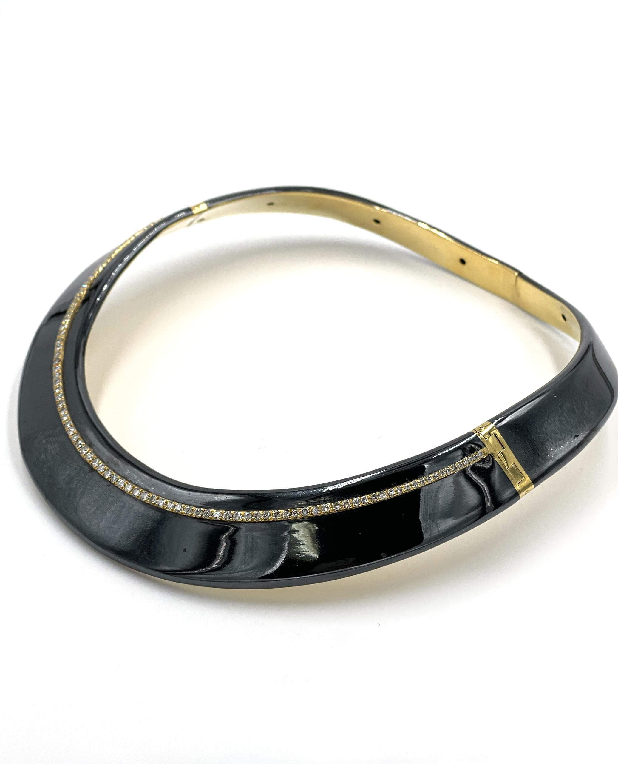 Pre owned vintage estate 18K yellow gold collar necklace with black enamel and diamonds.  The heavy weight hollow collar is hinged on the sides and slightly oval shaped to fit the curve of the neckline.  The front is set with 97 round brilliant-cut