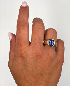 Bague d'occasion en or jaune 18 carats avec tanzanite et 0,50 carats de diamants