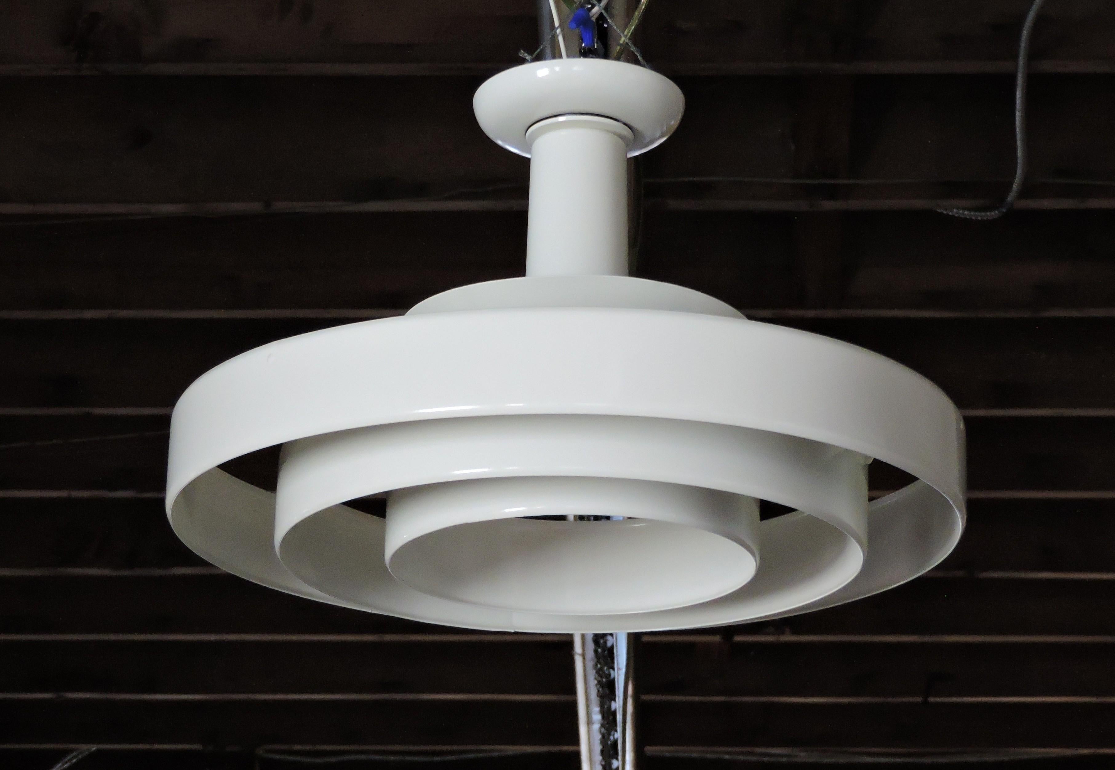 Classic ring light made by Prescolite in the 1950s/60s. This flush mount fixture consists of three concentric rings which nicely diffuse the light. It has been freshly powder coated and has new wiring.