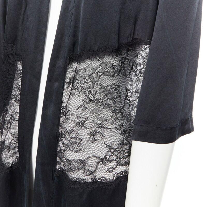 PRESENT LONDON black 100% silk floral lace panel lingerie short kimono robe UK8
Reference: LNKO/A01162
Brand: Present London
Material: Silk
Color: Black
Pattern: Solid
Closure: Self Tie
Extra Details: Kimono robe. Lace panel at waist.
Made in: