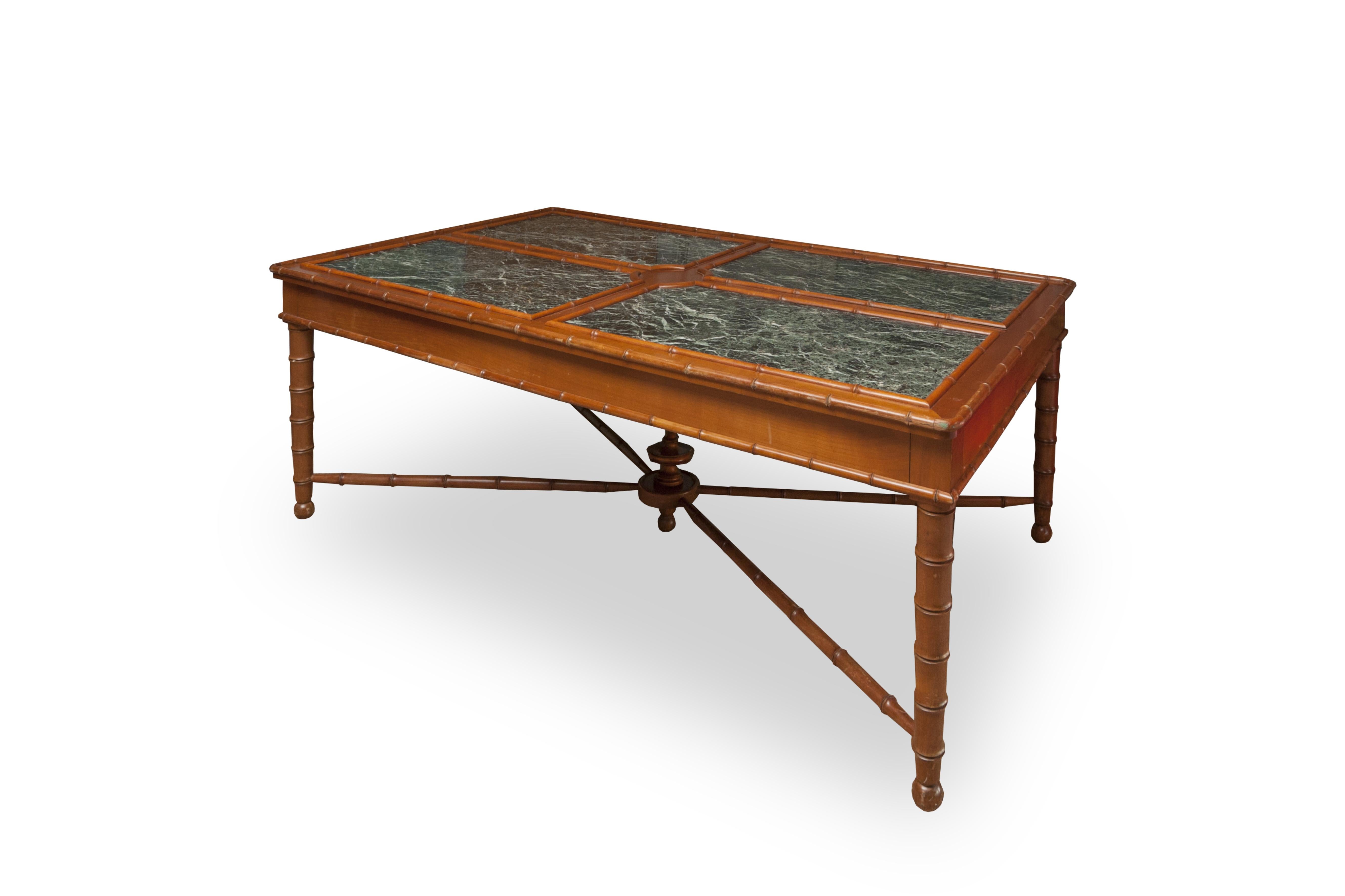 Large wooden presentation table, whose elements are carved in the shape of bamboo. This table was obviously designed from the very beginning to present quality objects. 

Indeed, its top is organized in four parts plated with green marble around