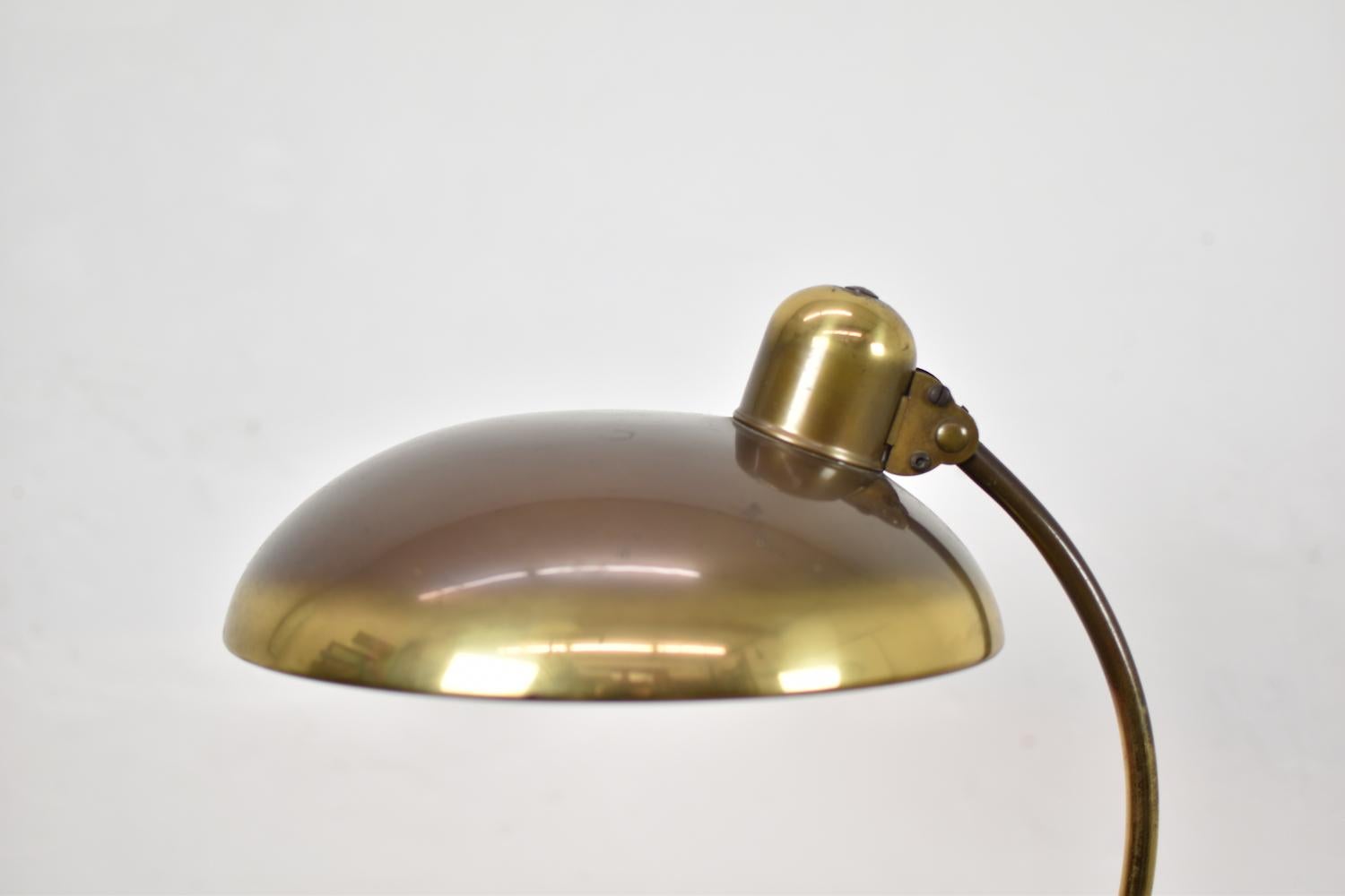 Lovely ‘President’ desk lamp by Christian Dell for Kaiser Idell, Germany 1930s. This table lamp is made out of brass and both arms and shade are fully adjustable. Very nice original condition with visible signs of age and wear. Labeled.