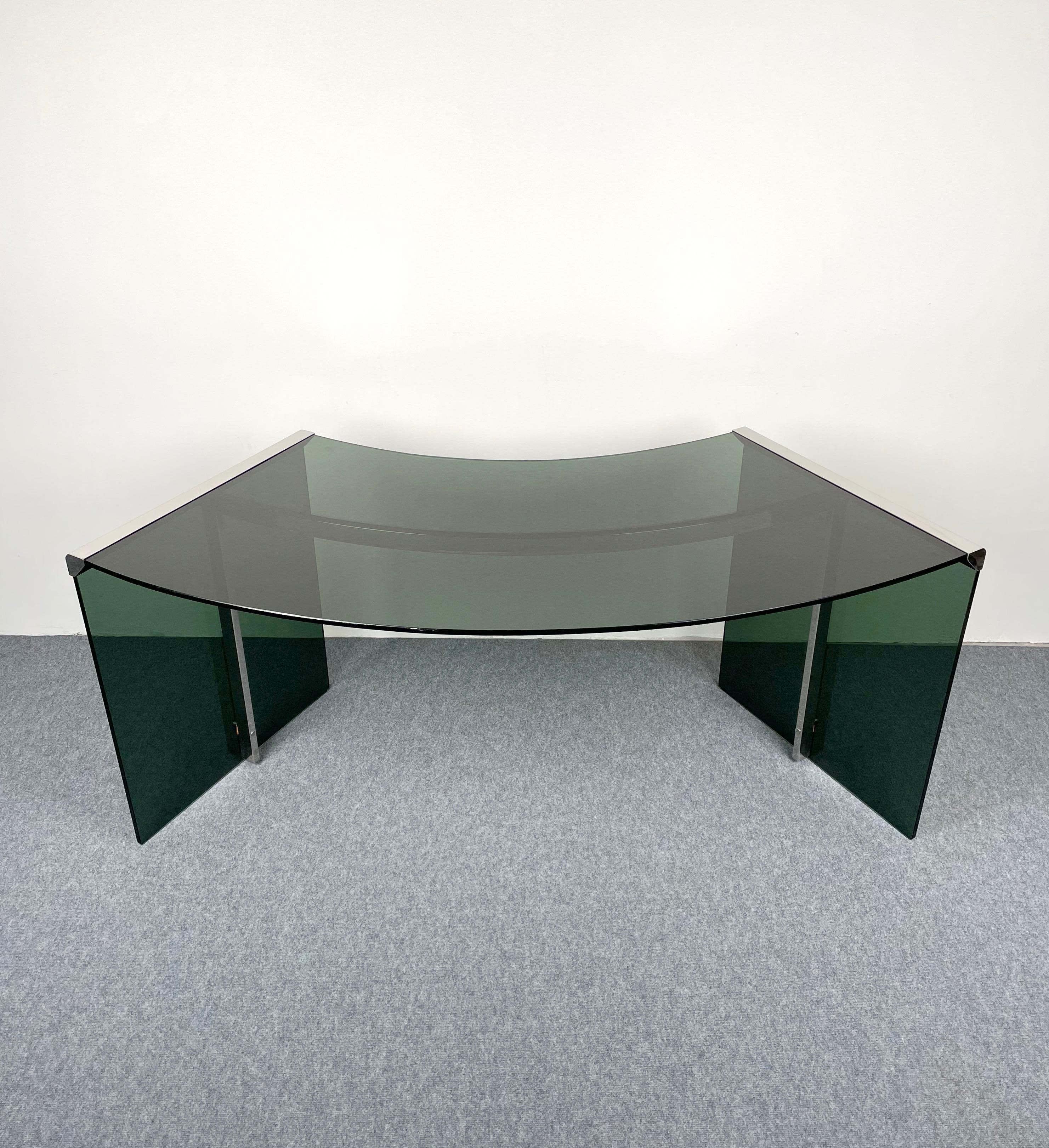 Designed in 1971 by Studio GR, this arc shaped dark smoked glass desk by Gallotti & Radice is named 
