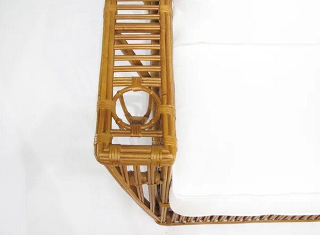 Stick Rattan “Nantucket” Lounge Chair.

This striking Nantucket lounge chair features classic stick rattan framing with tightly woven wicker wrappings, offering both form and function. Each arm includes thoughtful built-in conveniences: a magazine