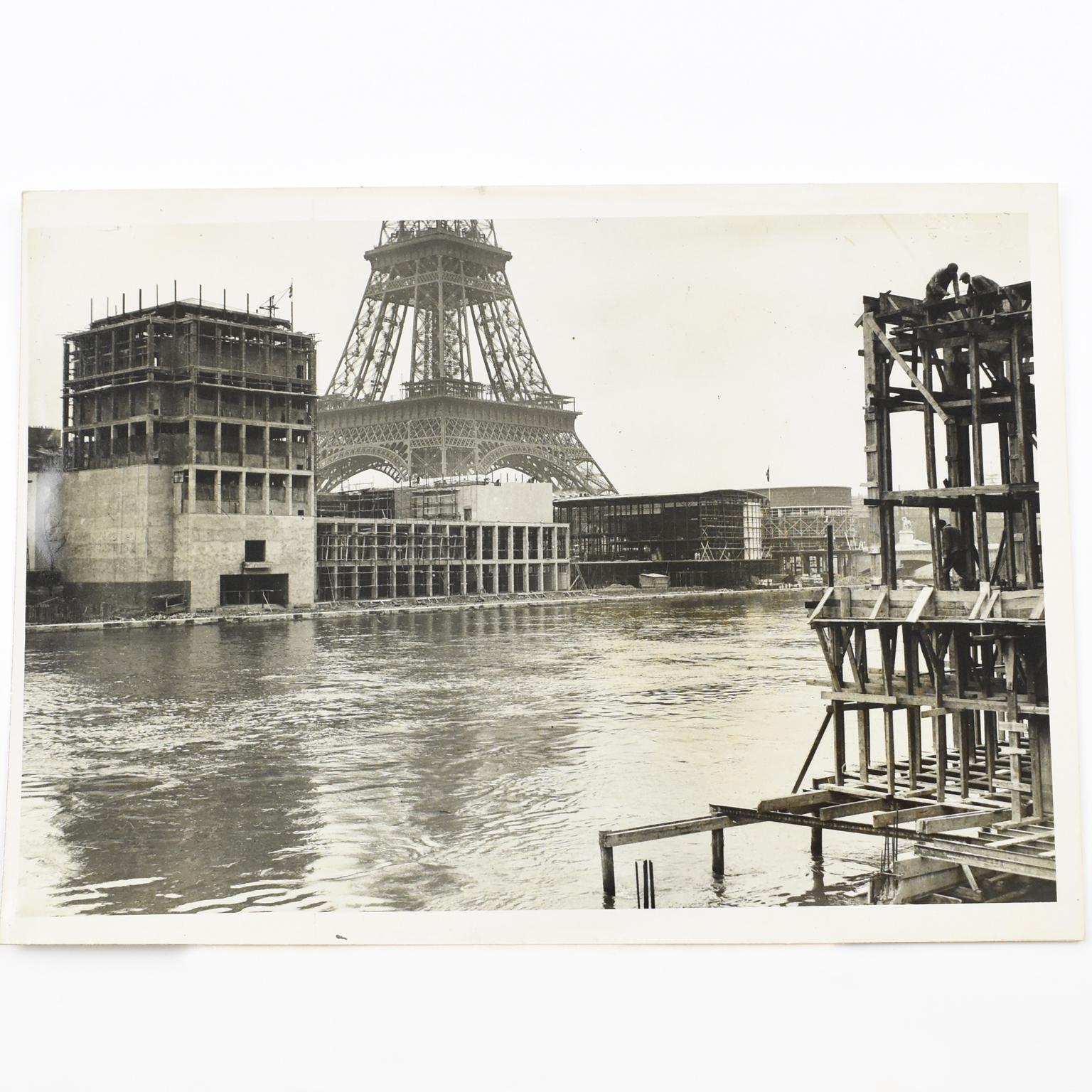 An original silver gelatin black and white photograph by Press Agency ROL, Paris 1937. The International Exhibition Construction, with the Eiffel Tower in the background.
Features:
Original silver gelatin print photograph unframed.
Press