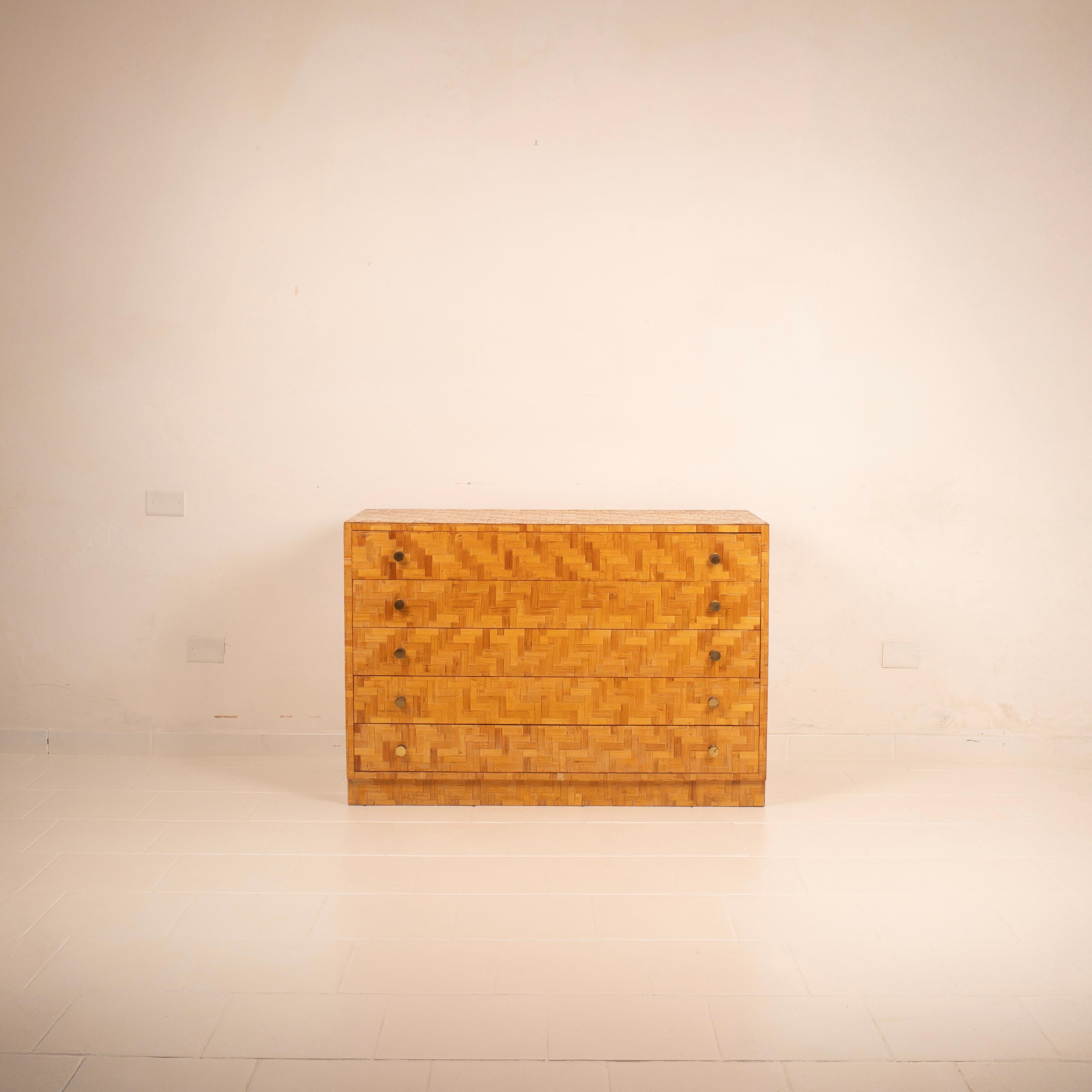 Exceptional four-drawer chest by Vivai del Sud, the iconic Italian atelier known for its use of natural materials and a refined, exotic style, particularly active between the 1960s and 1980s. This piece perfectly embodies the brand’s sophisticated