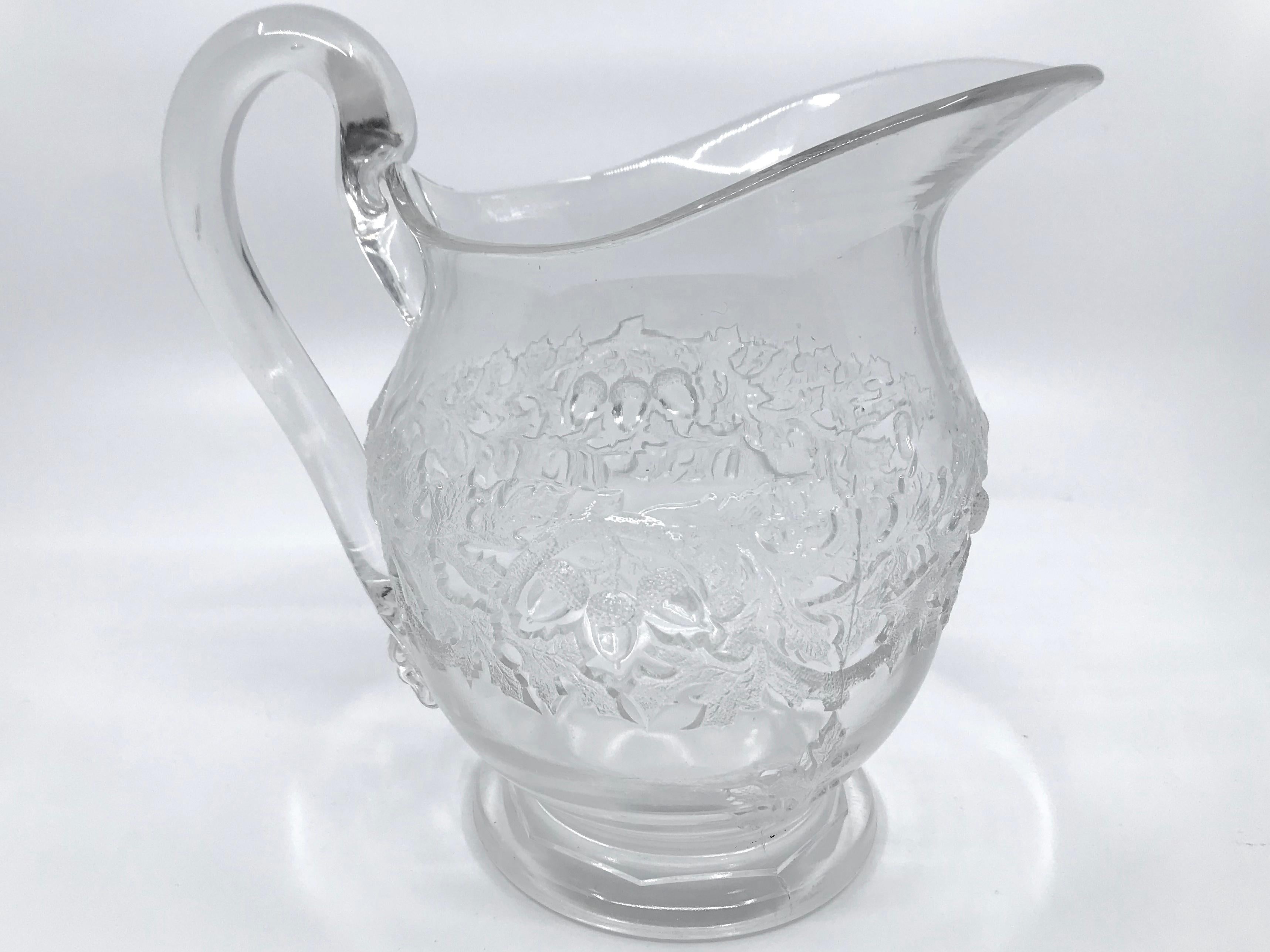 white milk glass pitcher with grapes