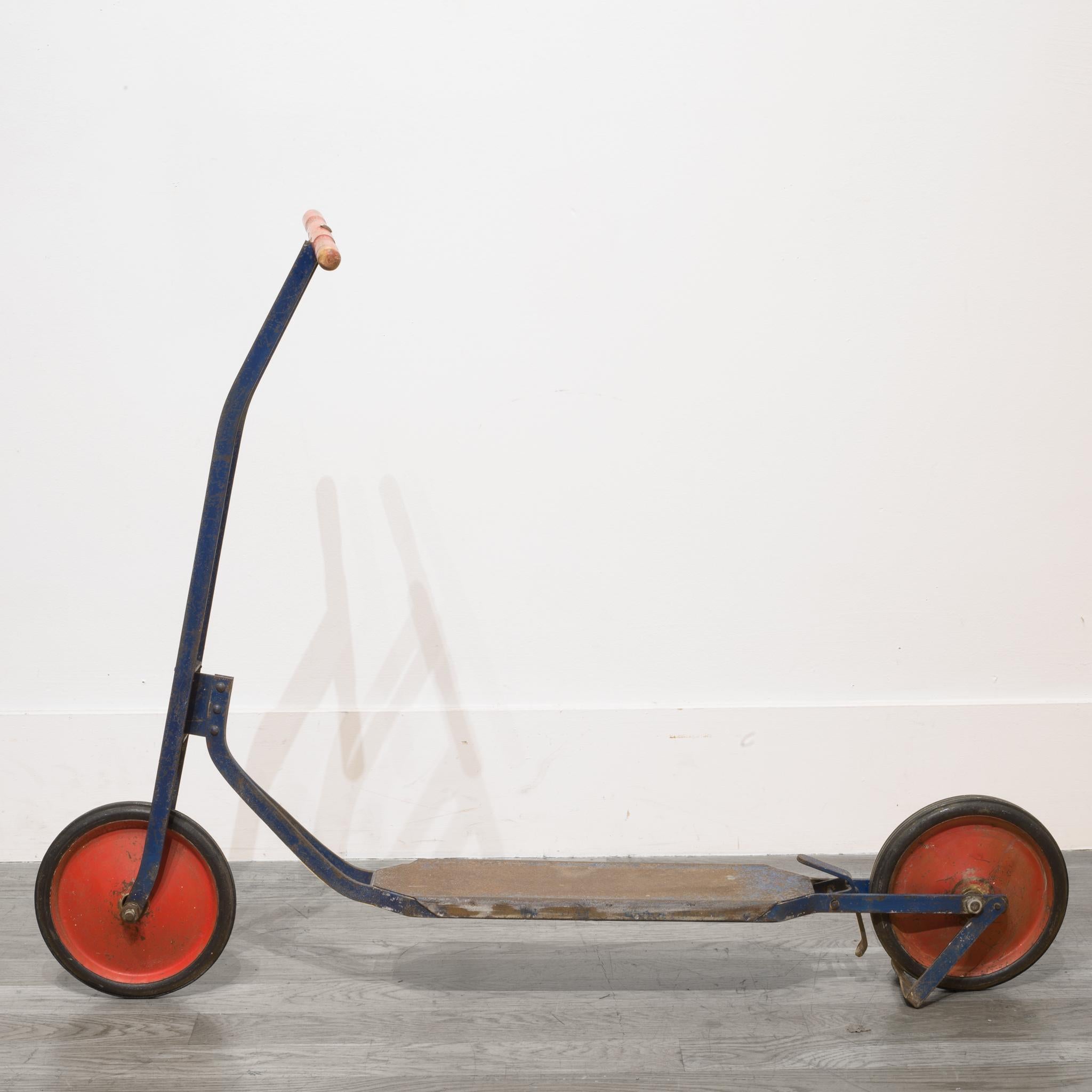 About

This is a pressed steel push scooter with wooden handle, rubber tires, back break peddle and back kick stand.

Creator Unknown.
Date of manufacture circa 1940s.
Materials and techniques pressed steel, wood, rubber.
Condition good. Wear