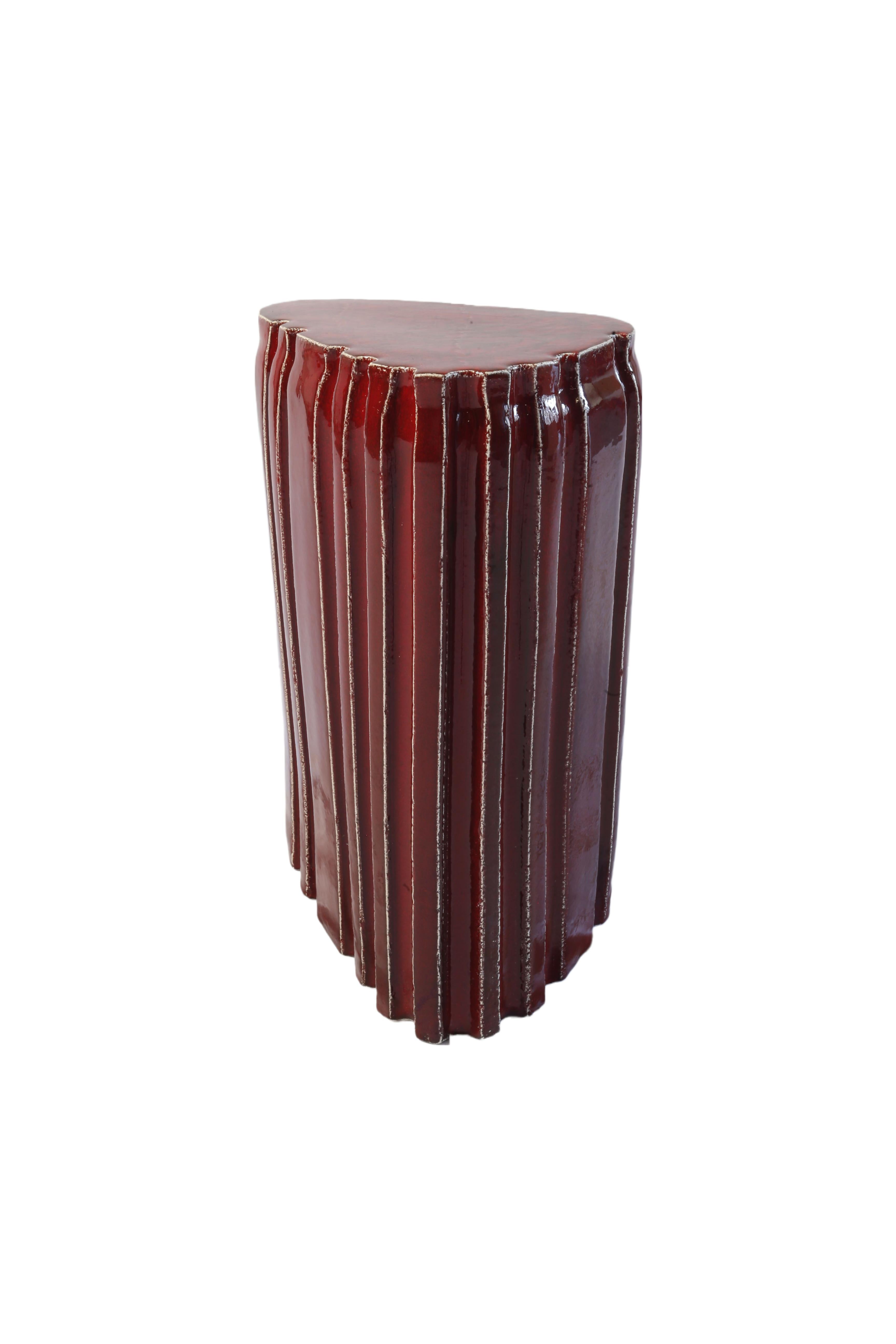 red ceramic stool