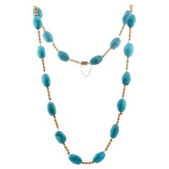 Collar largo de eslabones de oro amarillo con turquesa prensada