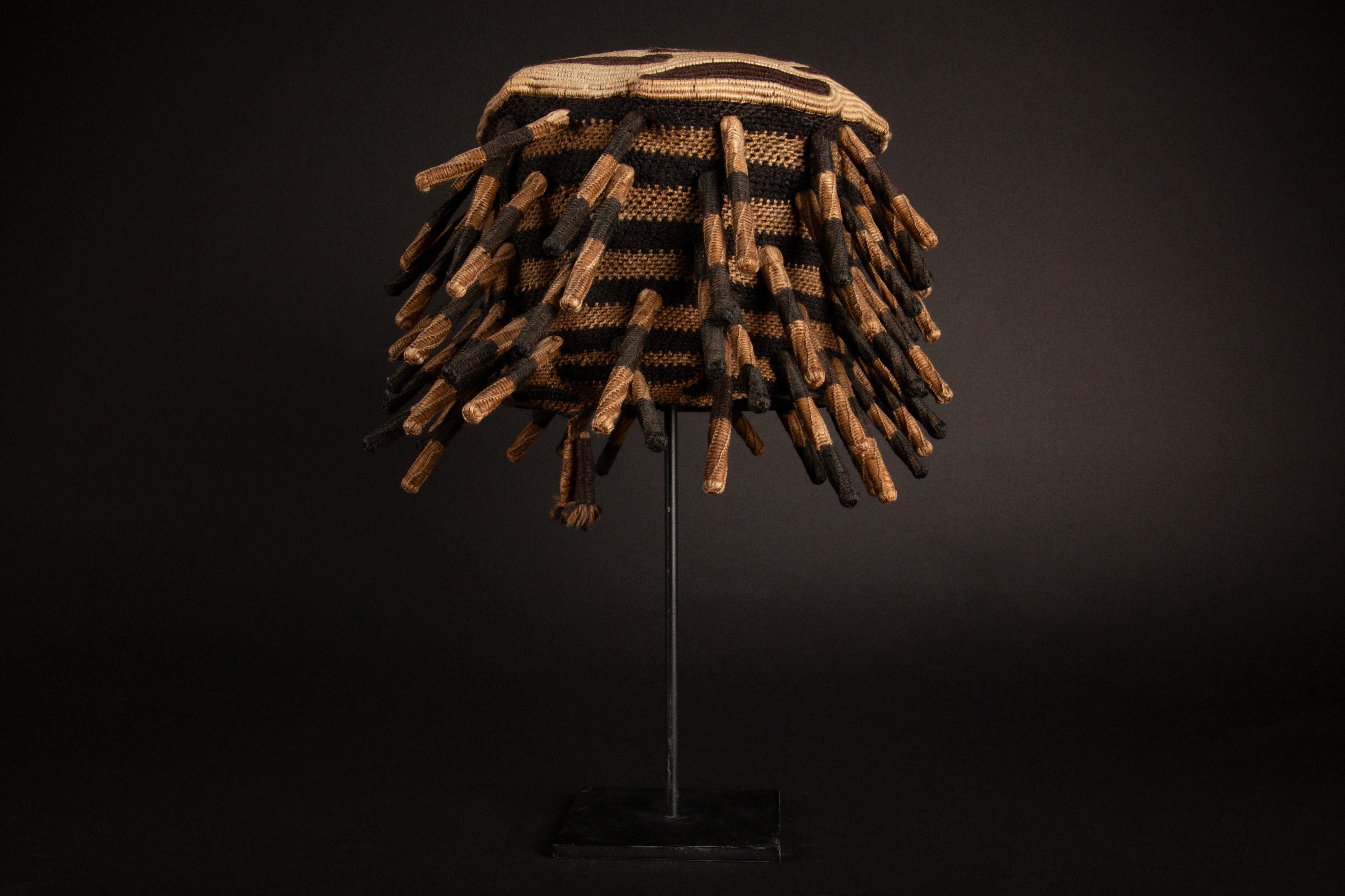 Tribal Prestige and Tradition: The Mounted Ashetu Hat of the Bamum and Bamileke People For Sale