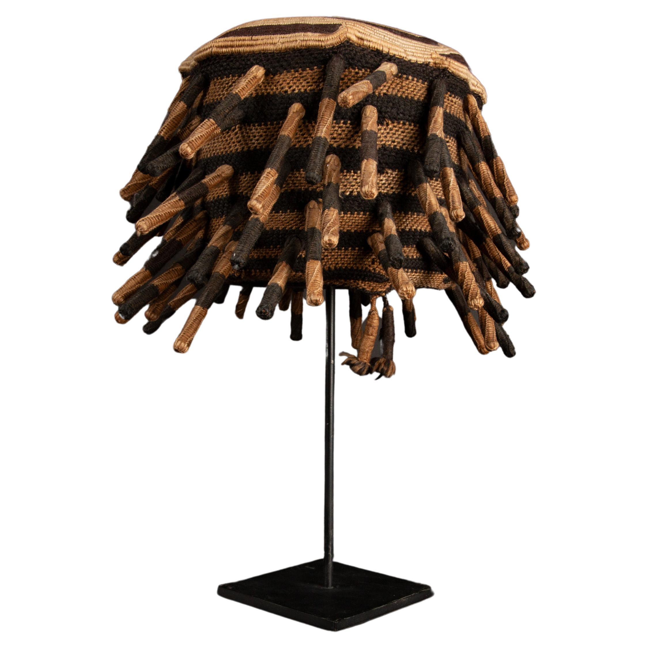Prestige and Tradition: The Mounted Ashetu Hat of the Bamum and Bamileke People For Sale