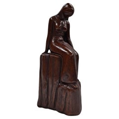 Preston L Prescott (1898-1988, estadounidense) Escultura en piedra de mujer joven sentada