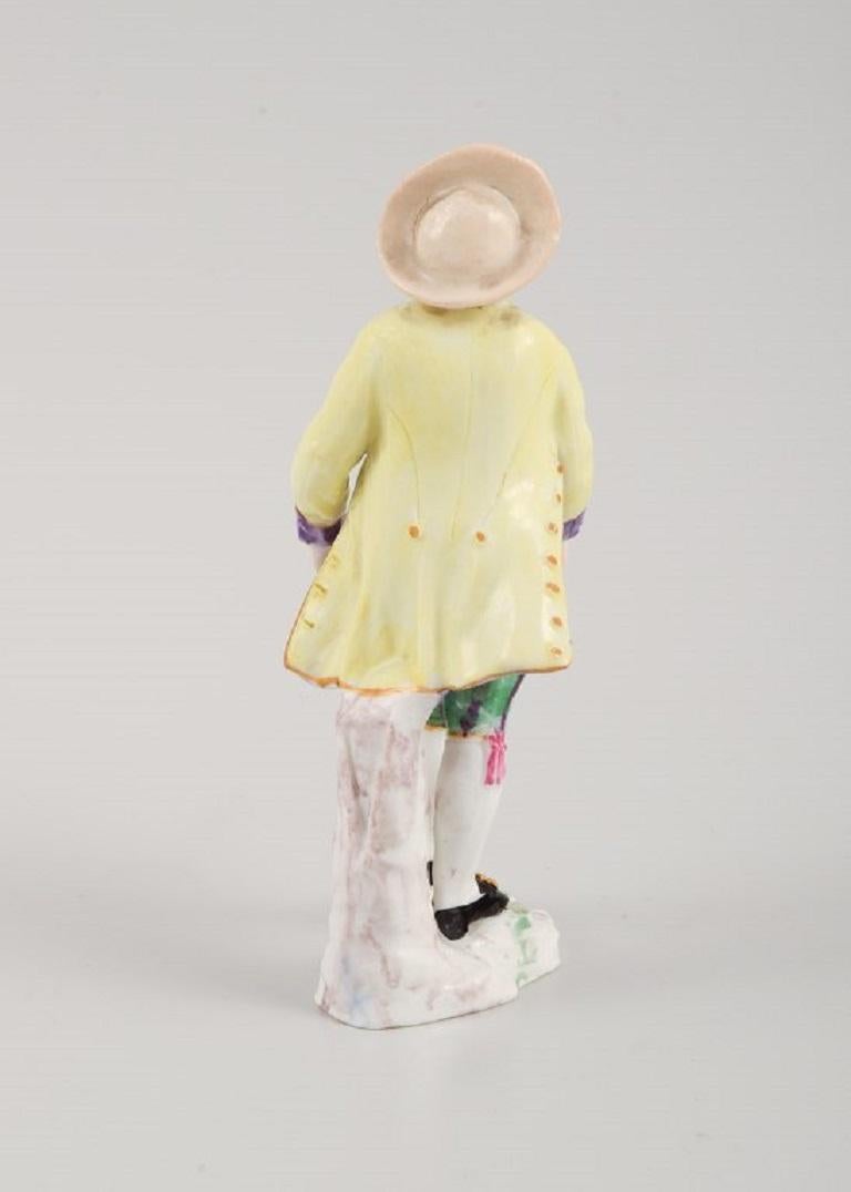 19th Century Presumably German Porcelain Figure, Man with Flower Basket, 19th C For Sale