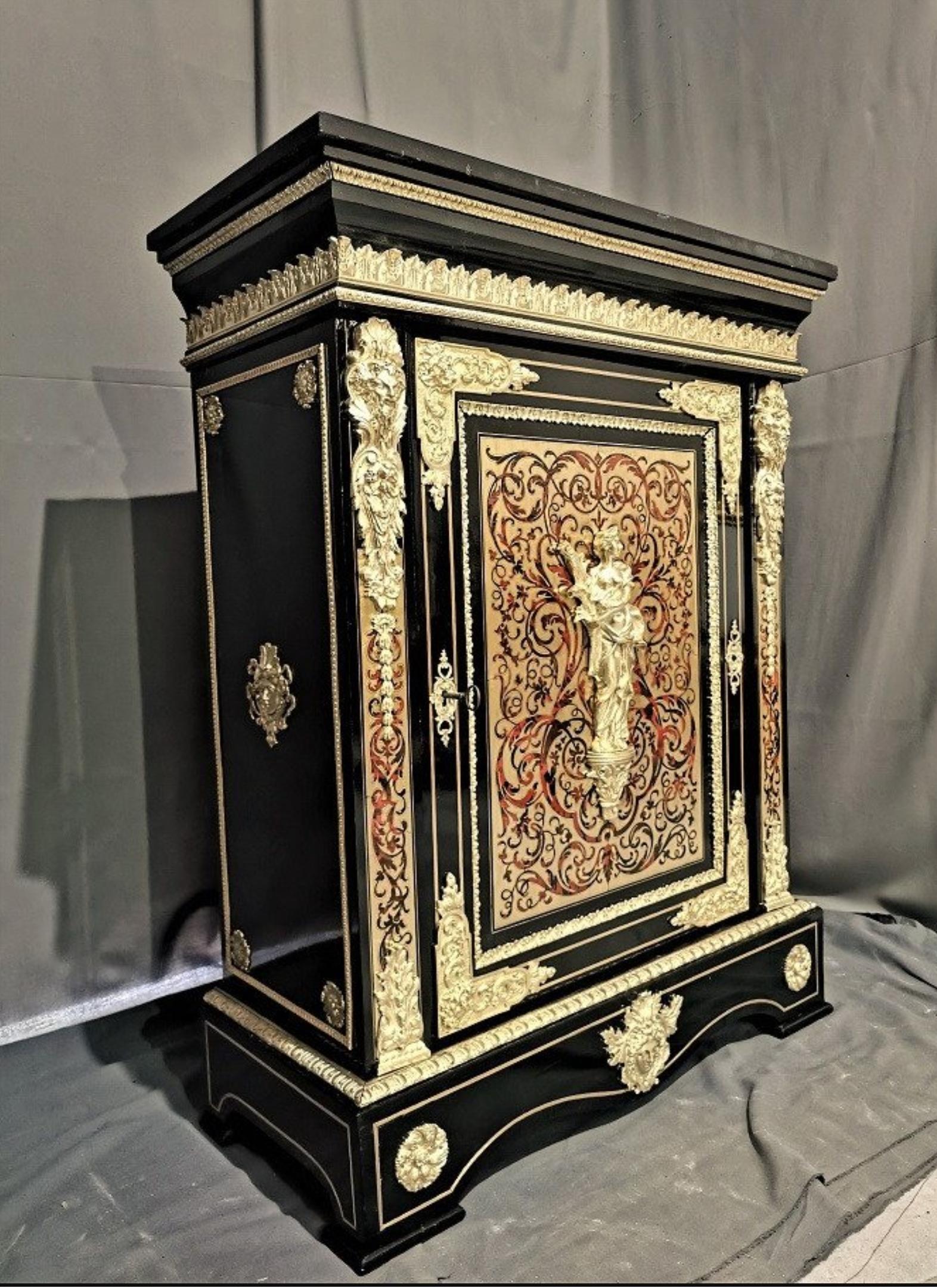 Very important cabinet signed by Pretot in Boulle style marquetry.