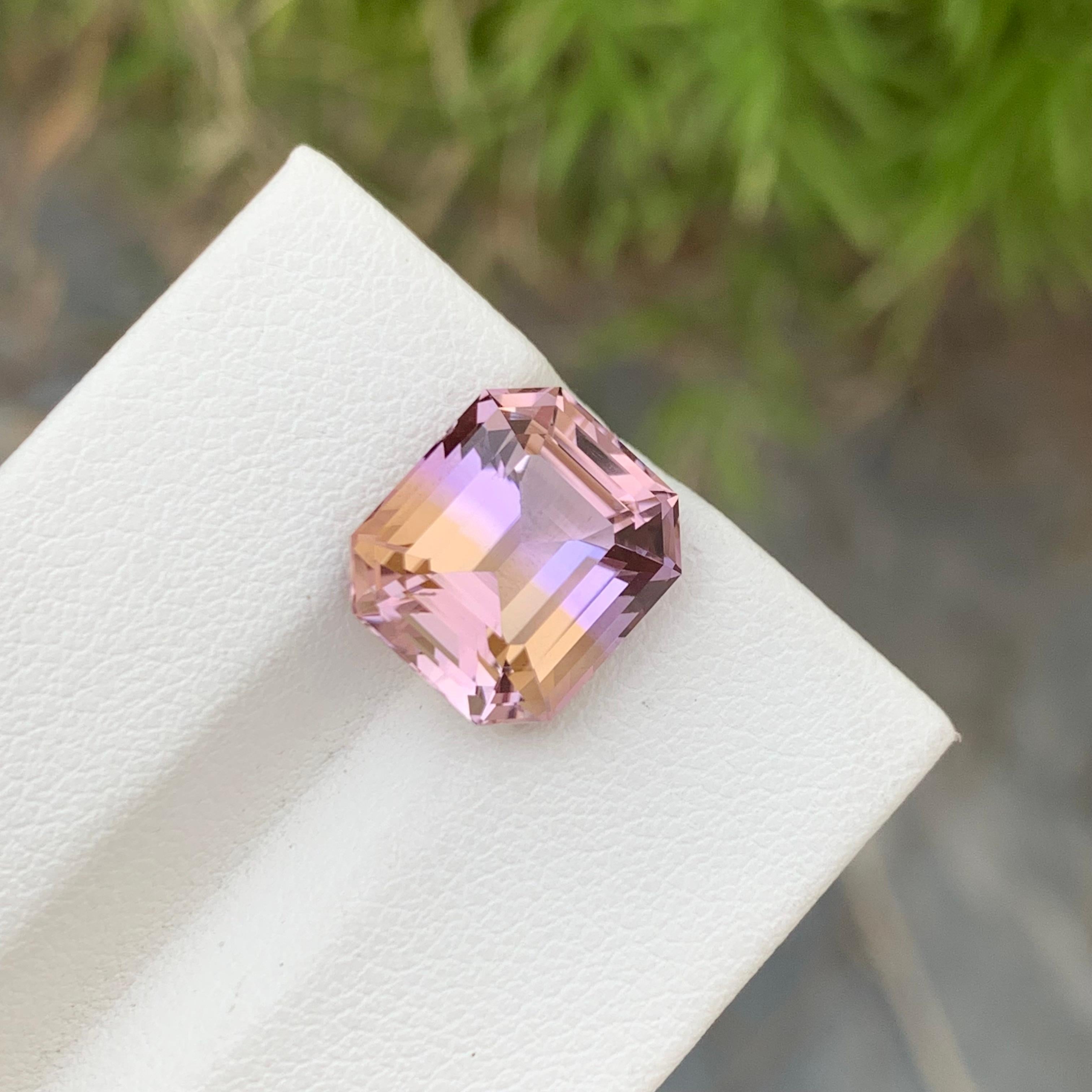 Loose Ametrine 
Weight: 5.95 Carat 
Dimension: 11.5 x 10.1 x 7.9 Mm 
Origin: Brazil 
Cut: Asscher 
Certificate: On Demand 
Color: Purple and Yellow 

Ametrine is a captivating gemstone that combines the vibrant hues of amethyst and citrine, creating
