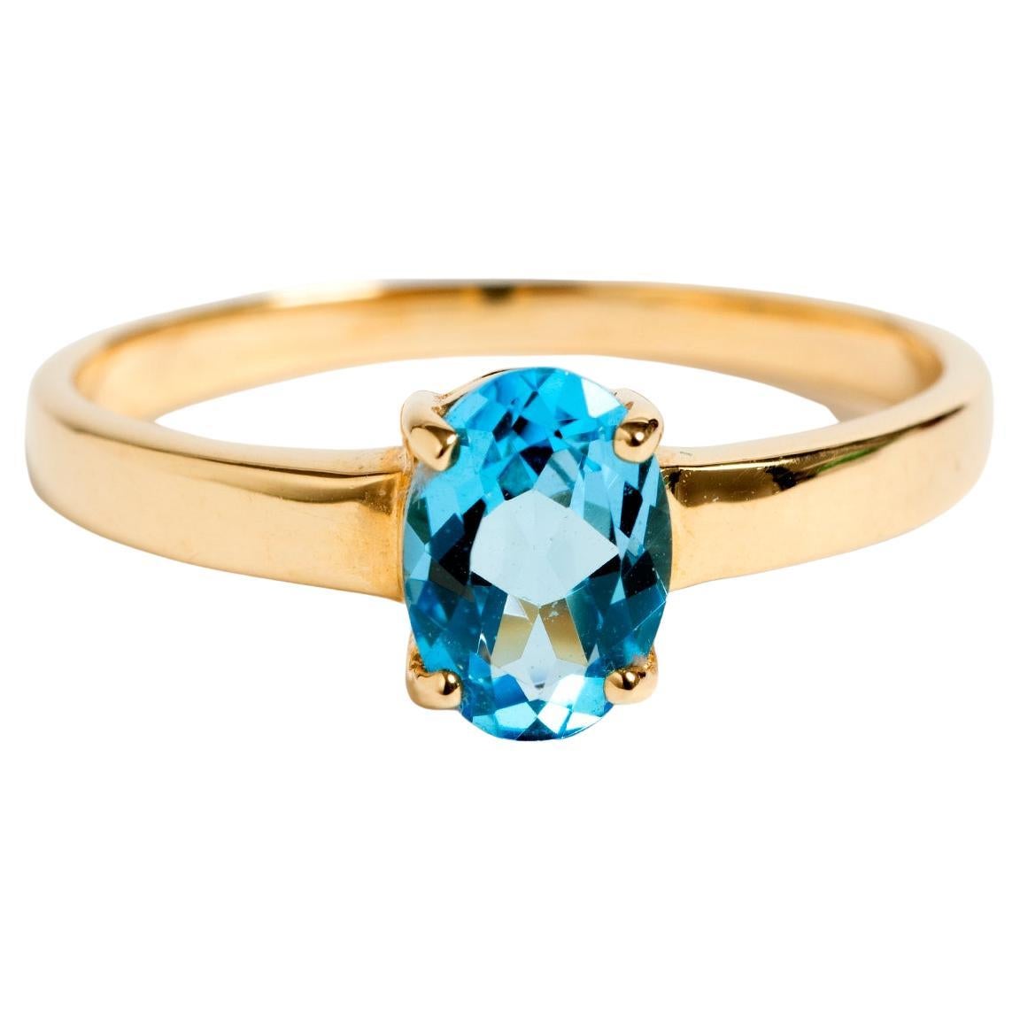 Pretty 9K Yellow Gold, Blue Topaz Ring, US Size 6 1/2. For Sale
