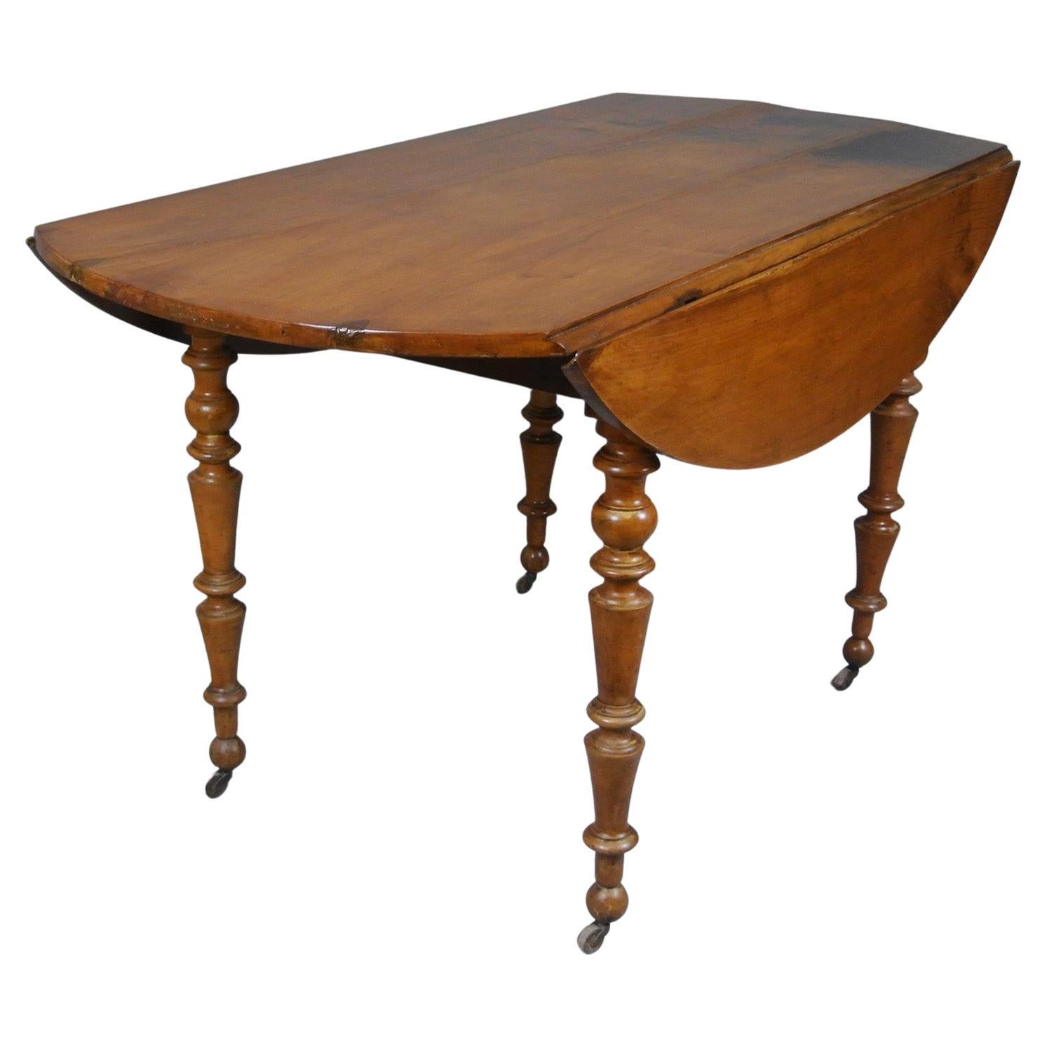 Pretty and Practical French Fruitwood Oval Drop Leaf Table c. 1880 For Sale