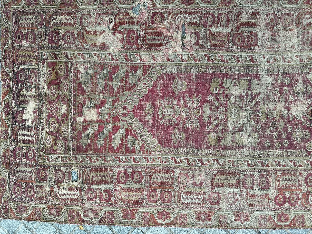 Oushak Bobyrug’s Pretty Antique 18th century distressed Turkish Ghyordes rug For Sale