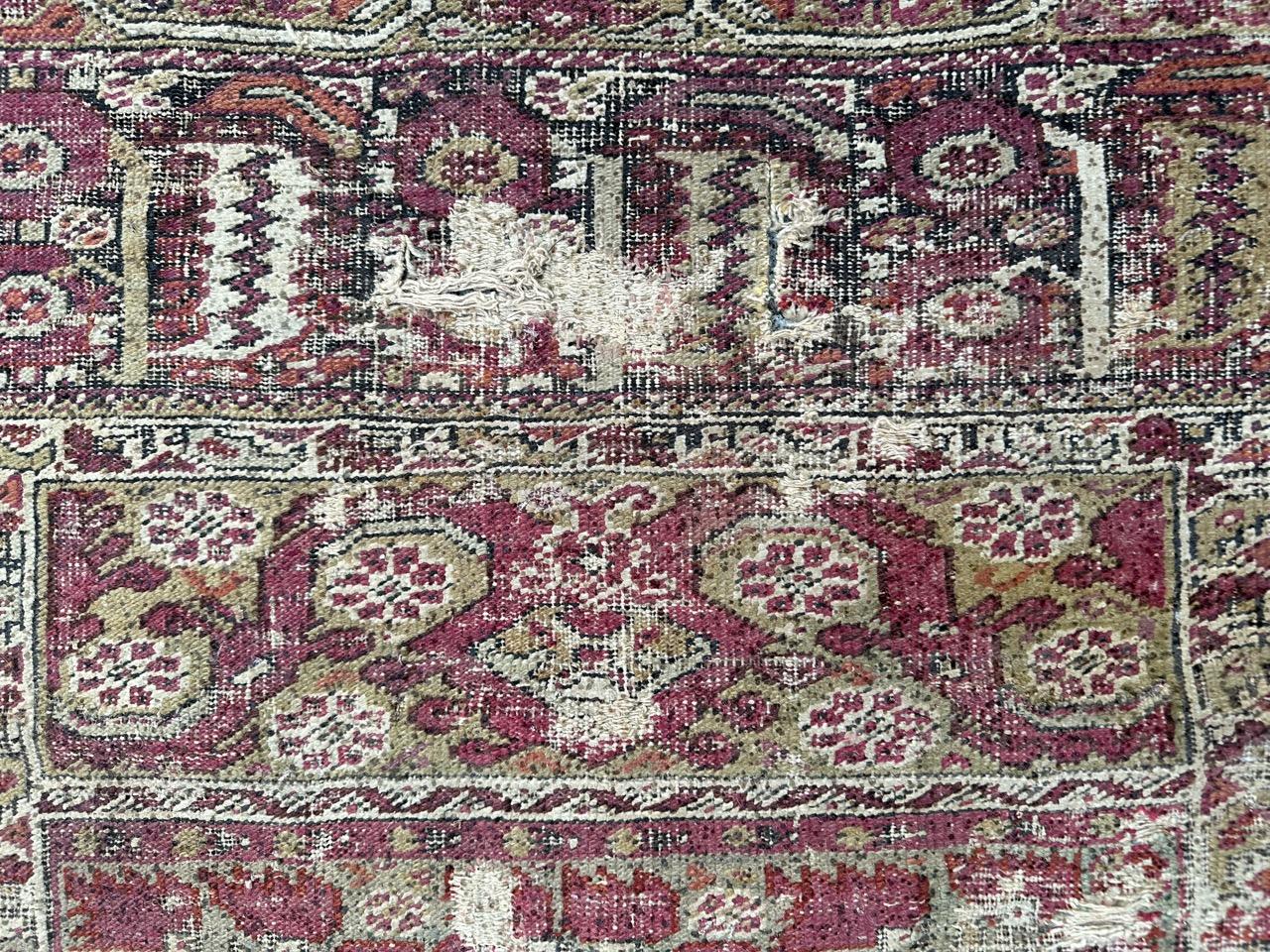 18th Century Bobyrug’s Pretty Antique 18th century distressed Turkish Ghyordes rug For Sale