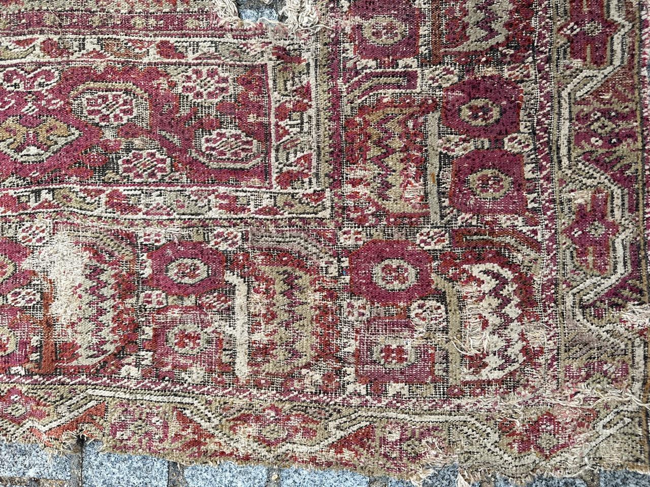 Bobyrug's Pretty Antique 18th century distressed Turkish Ghyordes rug im Angebot 1