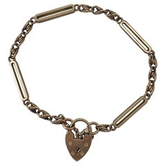 Grazioso bracciale antico in oro giallo 9ct con lucchetto a cuore