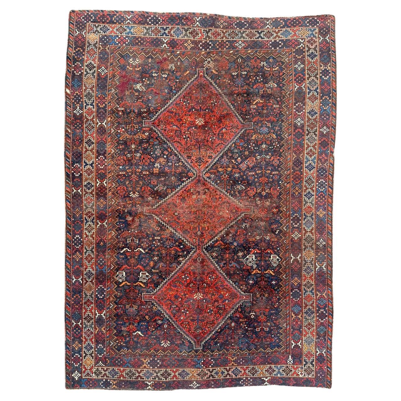 Pretty antique distressed Shiraz rug