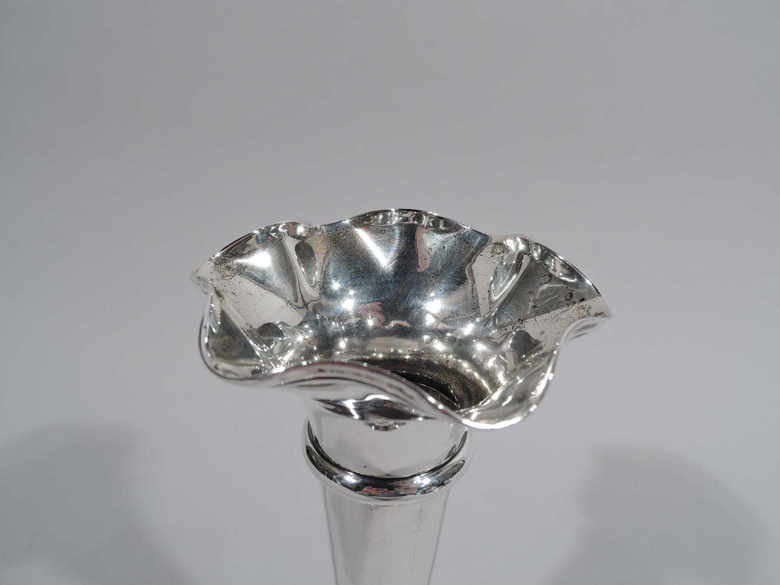 George V sterling silver bud vase. Made by Walker & Hall in Sheffield in 1911. Conical with top girdle and base knop on stepped and raised foot. Pretty ruffled rim to frame a special flower. Fully marked. Weighted.