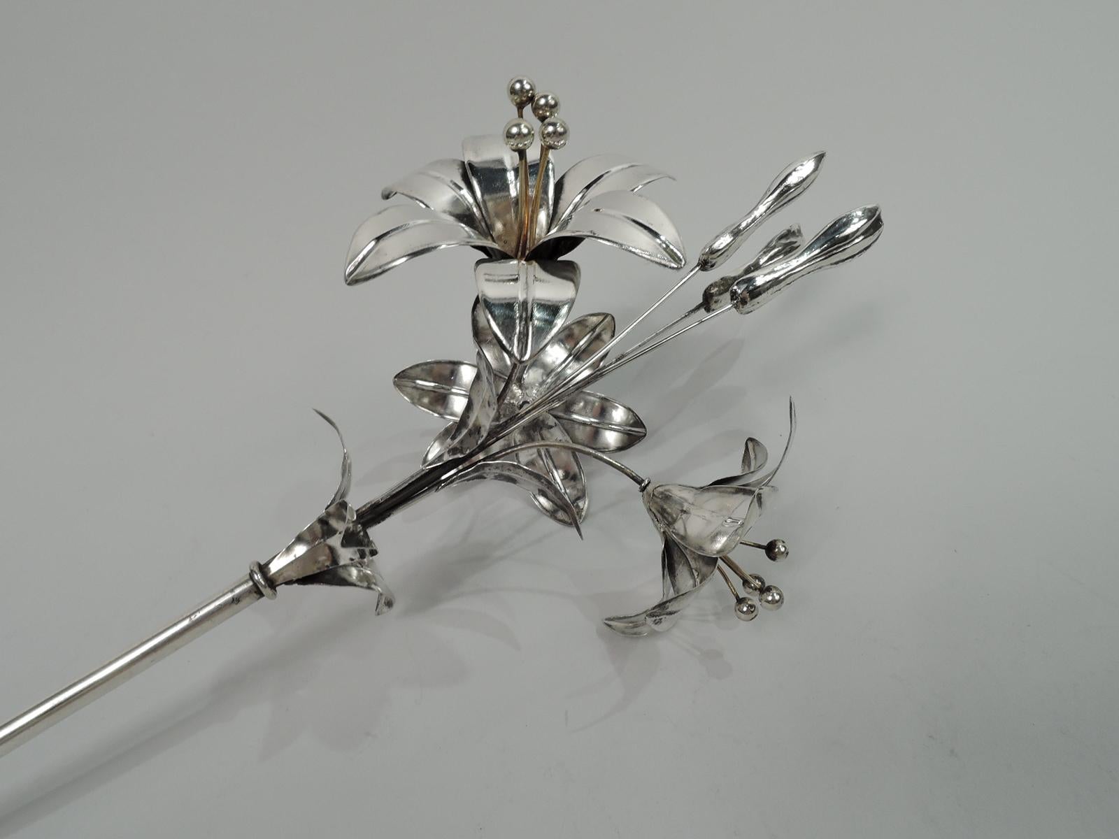 European silver ornament, ca 1920. Single plain hollow stem sprouting 3 flowers with ripe, splayed petals and prominent stamen surrounding 3 tight and tall buds. A pretty, hopeful ornament. Appears to be unmarked. Silver tests 800. Weight: 4 troy