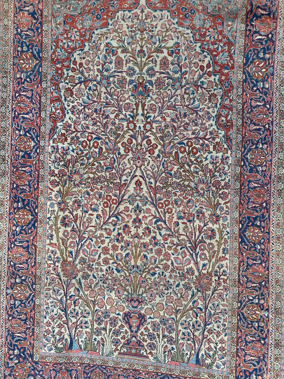 A stunning early 20th-century Kashan rug featuring a beautiful floral design and exquisite natural colors. This rug is a masterpiece of craftsmanship, entirely and finely hand-knotted with wool velvet on a cotton foundation.

While it's important to