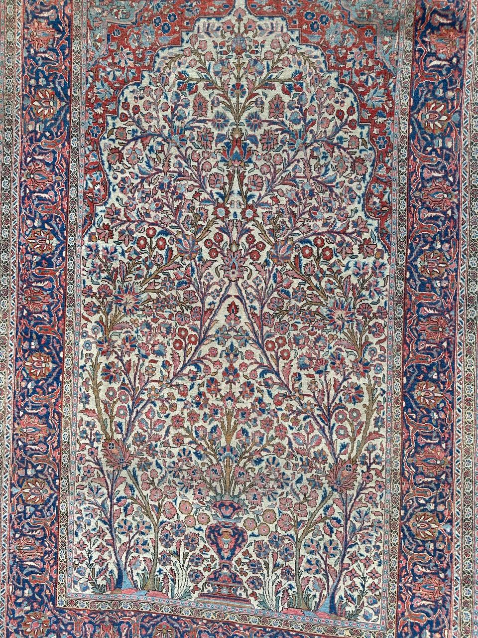 A stunning early 20th-century Kashan rug featuring a beautiful floral design and exquisite natural colors. This rug is a masterpiece of craftsmanship, entirely and finely hand-knotted with wool velvet on a cotton foundation.

While it's important to