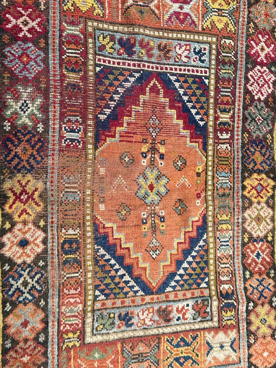Beautiful late 19th century Moroccan rug from Rabat, with beautiful geometrical and tribal design and nice natural colours, with orange, red, navy blue, sky blue, green, yellow and white, entirely hand knotted with wool on wool