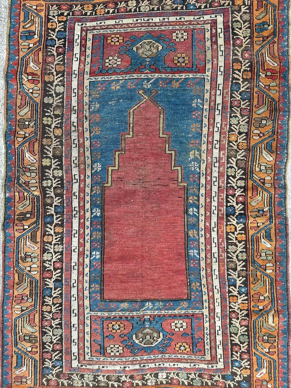 Pretty antique prayer rug from Turkey, with a mihrab design and nice natural colours with a red, blue, orange, green and white, entirely hand knotted with wool on wool foundation 
Small wears 

✨✨✨
