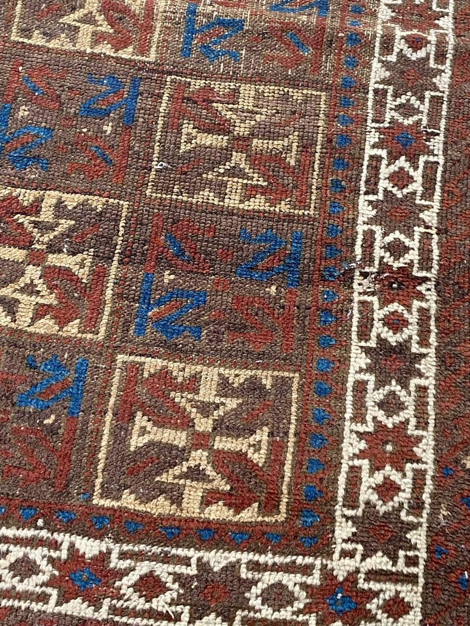 Afghan Bobyrug’s Pretty Antique Tribal Baluch Rug For Sale