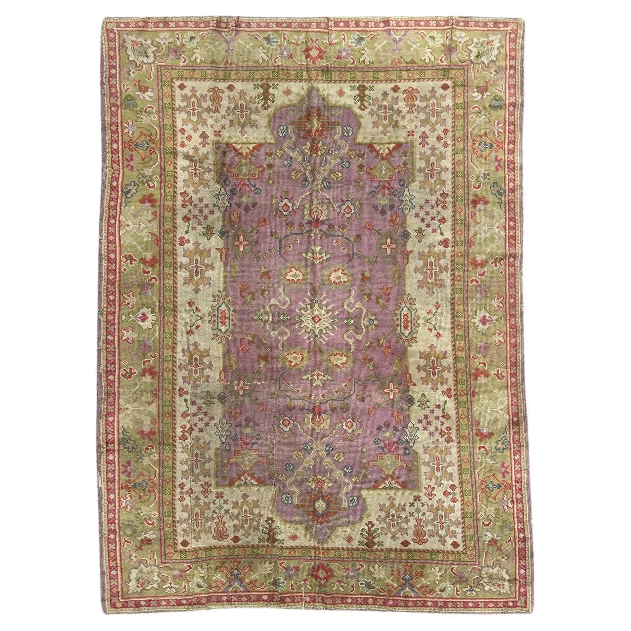 Pretty antique Turkish Ghyordes  oushak style rug