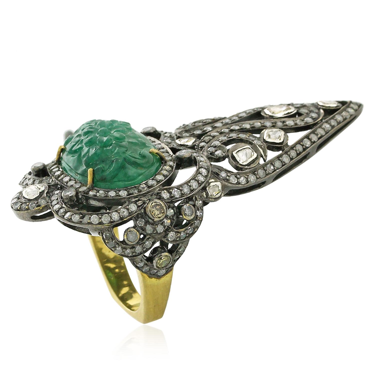 Oval shape carved emerald knuckle ring with pave and rosecut diamonds is pretty chic yet classic looking.

Ring Size: 7 ( can be sized )

18k: 3.12g
Diamond: 3.35ct
Slv: 8.31gm
Emerald: 9.10ct