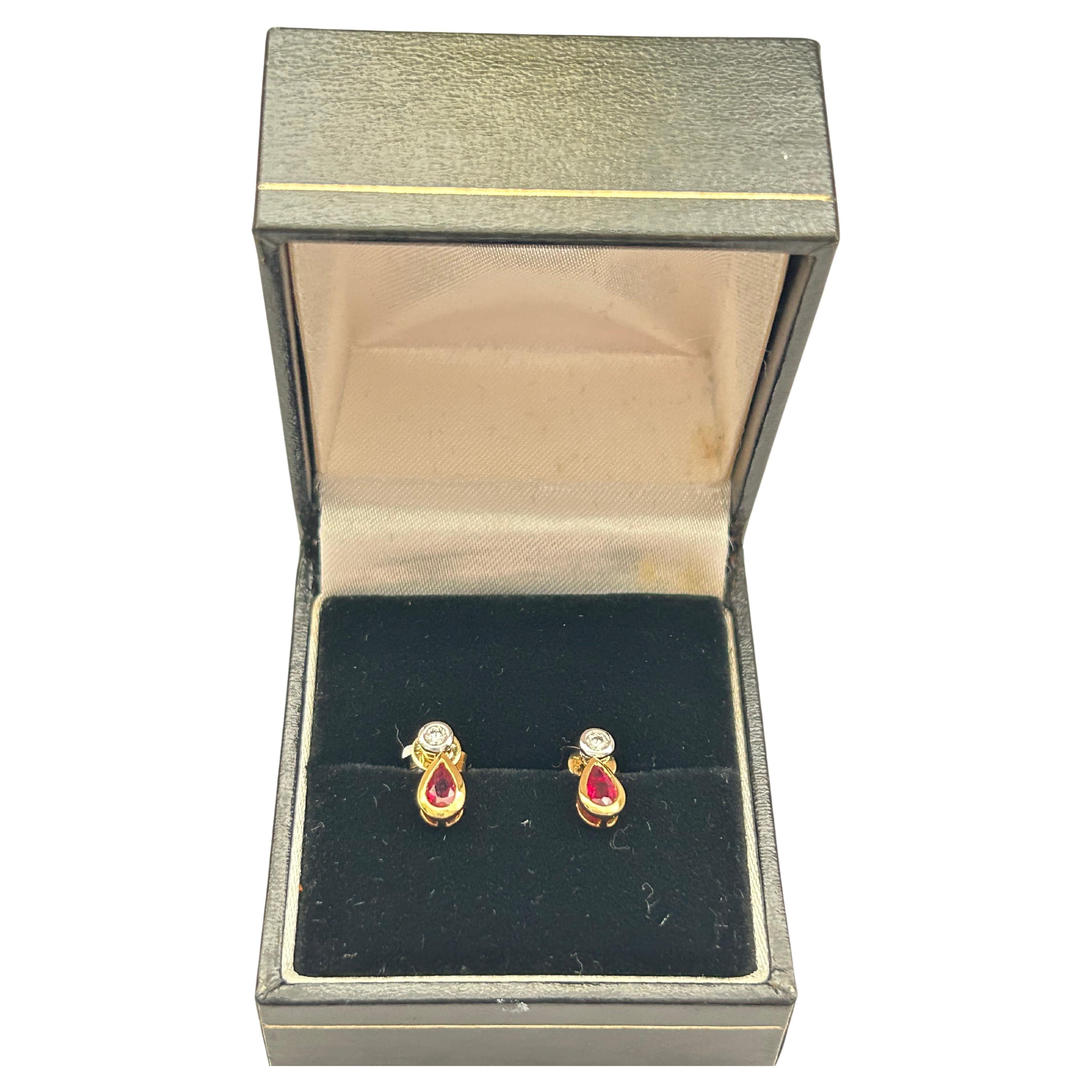 Pretty Diamond (est 0.08ct)  & Ruby (est .49ct) Drop Earrings. For Sale