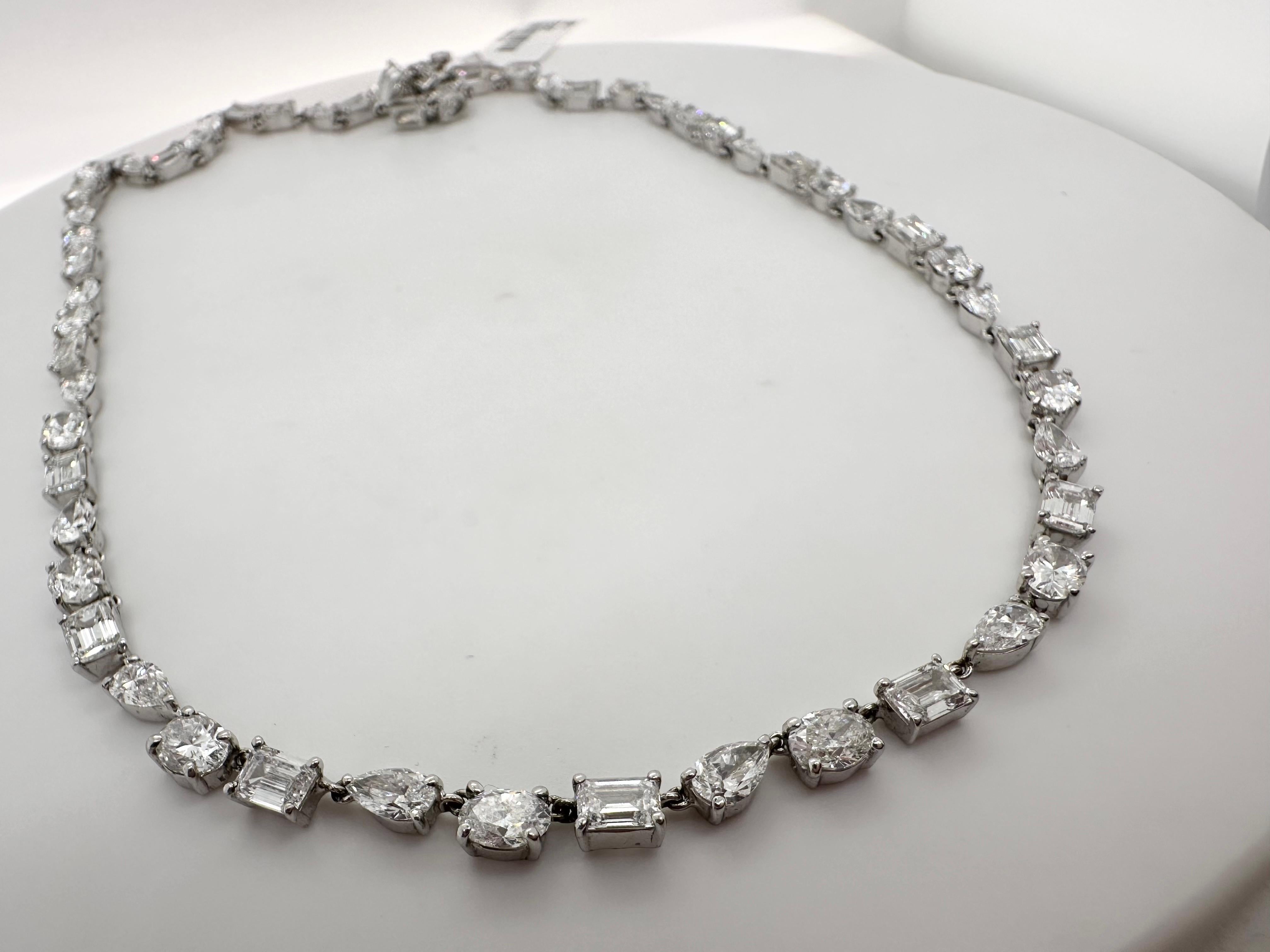 13 carats stunning diamond necklace of fine quality diamonds VVS-VS and F color. Made in this unique choker style necklace at 15 inches long with multiple shape diamonds so perfect for a night out as well as everyday wear! This necklace is made in