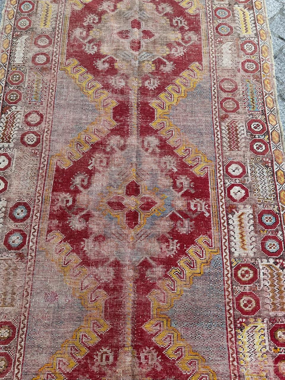 Oushak Bobyrug’s Pretty distressed antique Turkish runner For Sale