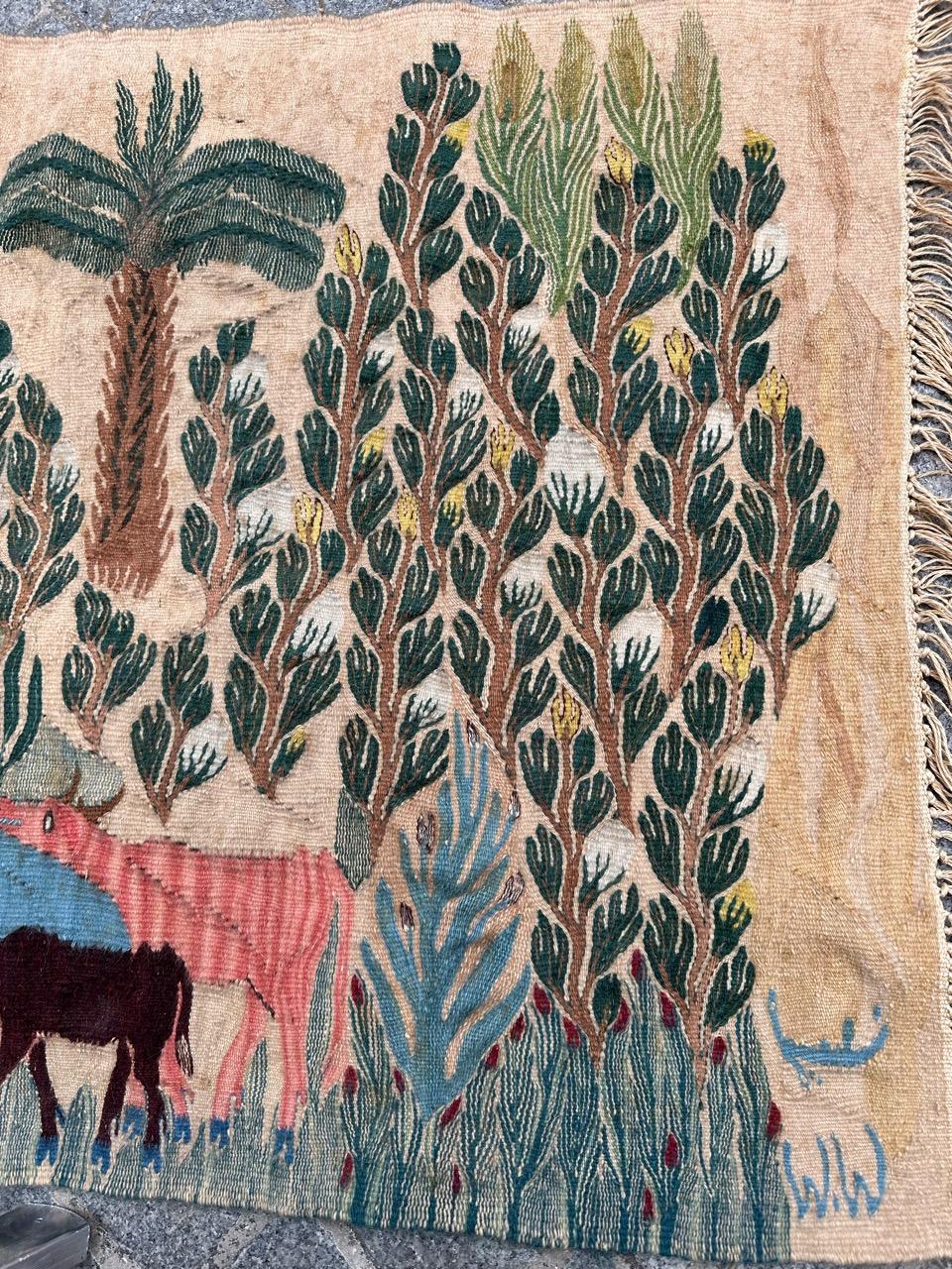 Nice midcentury Egyptian tapestry from the Ramsès Wissa Wassef school. With the monogram of W.W at the bottom of the tapestry and with the ticket on tissue with tampons at tissue on the back.
Ramses Wissa Wassef Art Center was founded in 1951 near