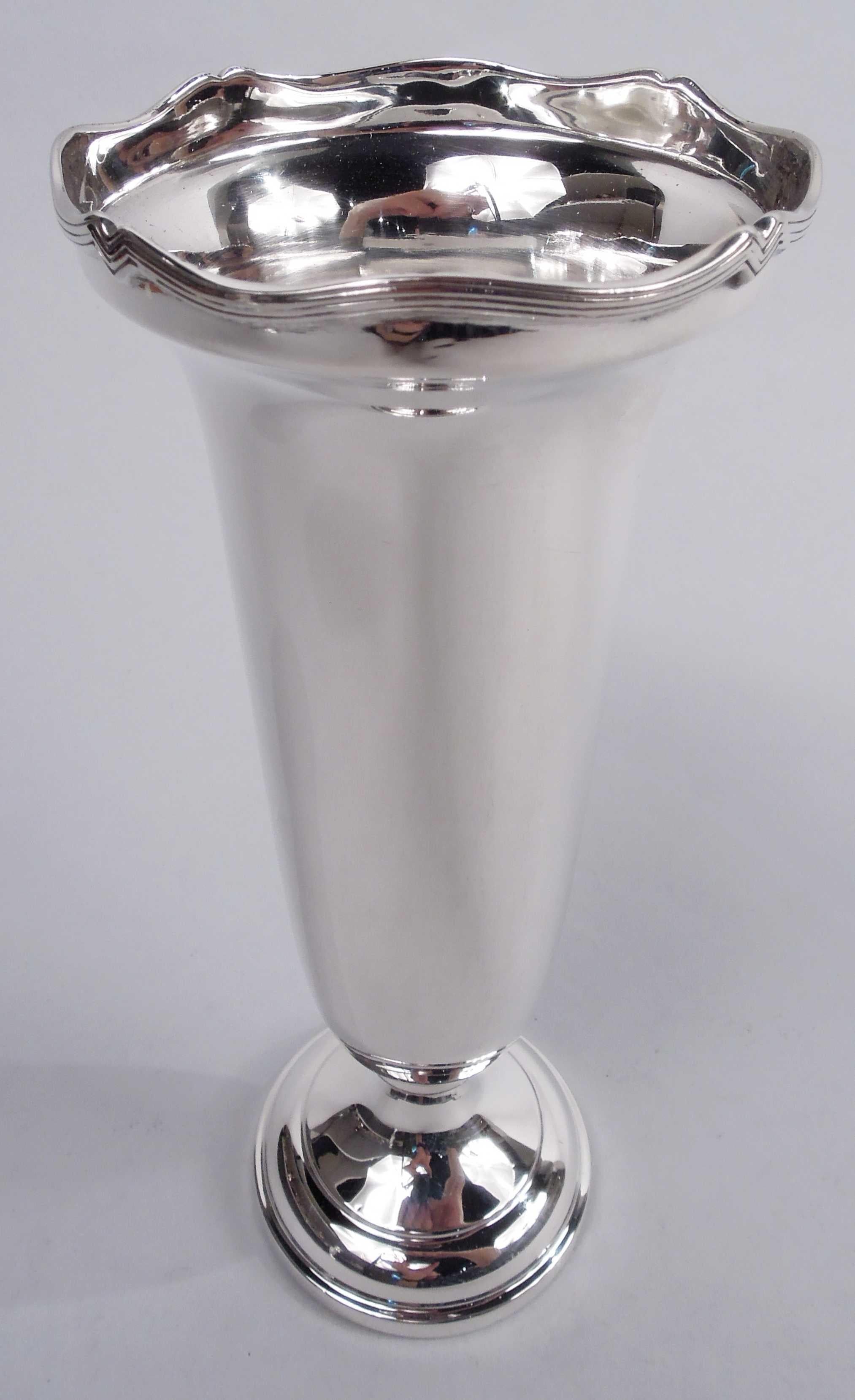 Pretty English Modern sterling silver vase, 1937. Straight and tapering sides with curved bottom; overhanging mouth has wavy curvilinear rim with applied reeding. Stepped and domed foot; foot underside wood lined. Fully marked including Birmingham