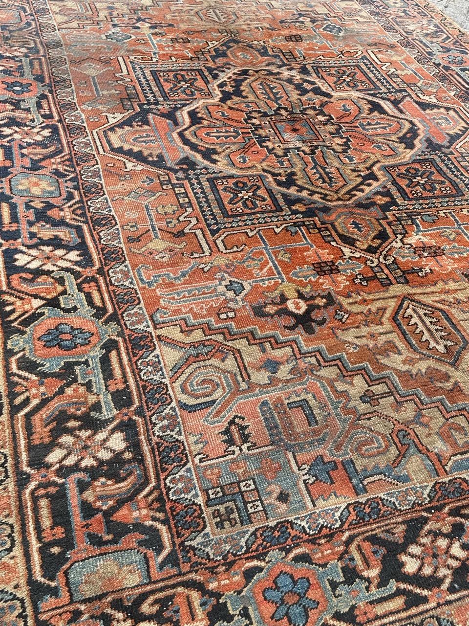 Beautiful late 19th century large Heriz rug with beautiful geometrical and stylized designs and nice natural colours with coral, navy blue, yellow and sky blue, entirely hand knotted with wool on cotton foundation.

✨✨✨
