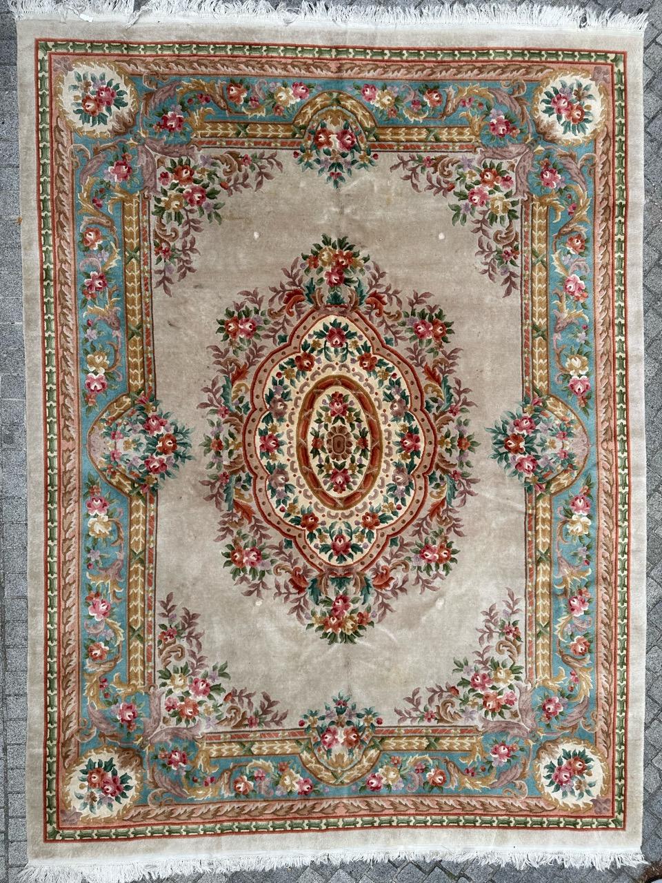 Exquisite Large Chinese Rug with Stunning French Savonnerie and Aubusson Style Floral Design

Discover the elegance of this magnificent Chinese rug! This pretty, generously sized piece boasts a beautiful floral design inspired by the renowned French