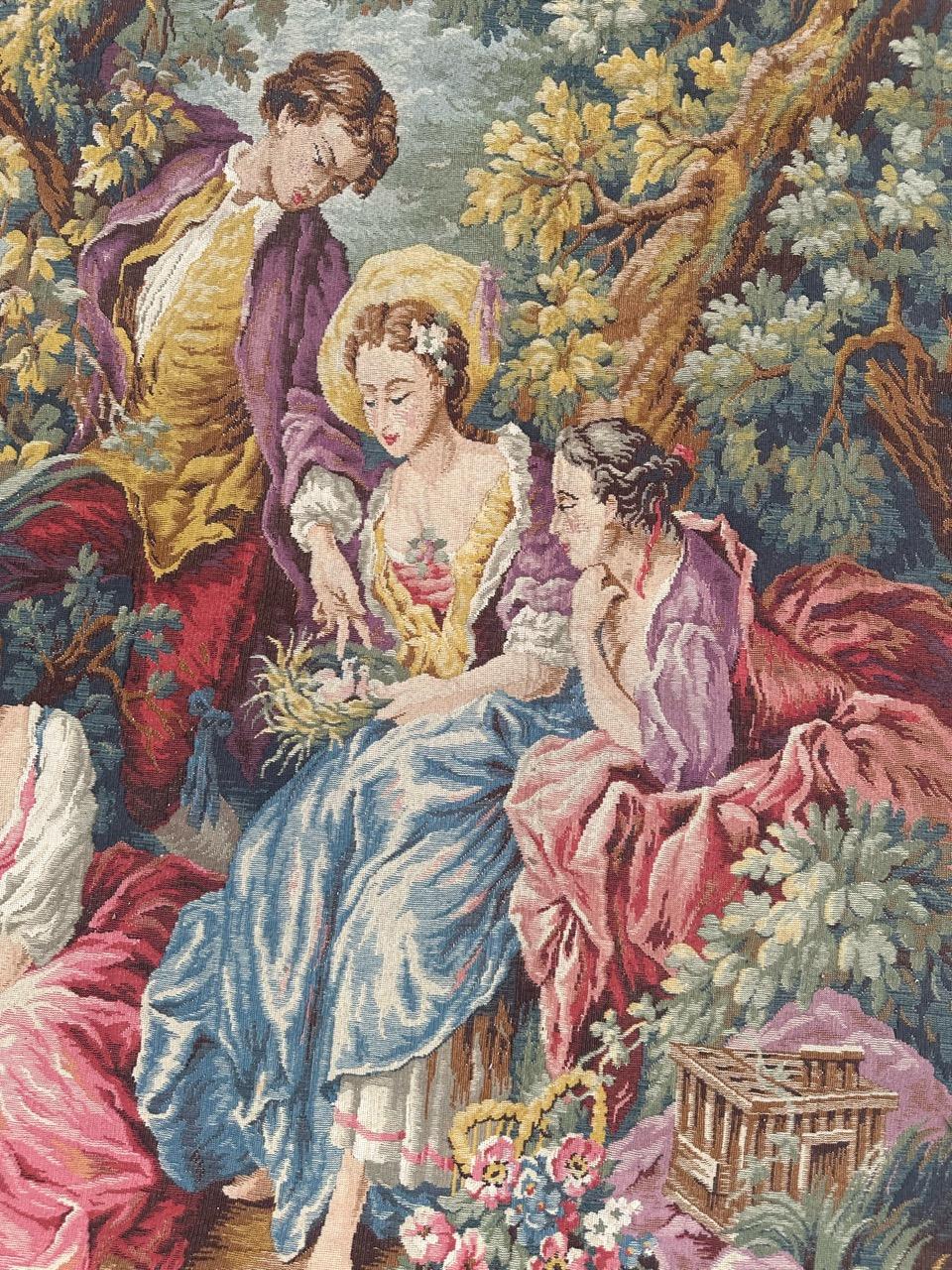 Discover the elegance of this midcentury Jaquar tapestry, a Jacquard masterpiece reminiscent of François Boucher's style. Adorned with a romantic design, vibrant hues of blue, yellow, green, pink, and red create a captivating scene of pastoral