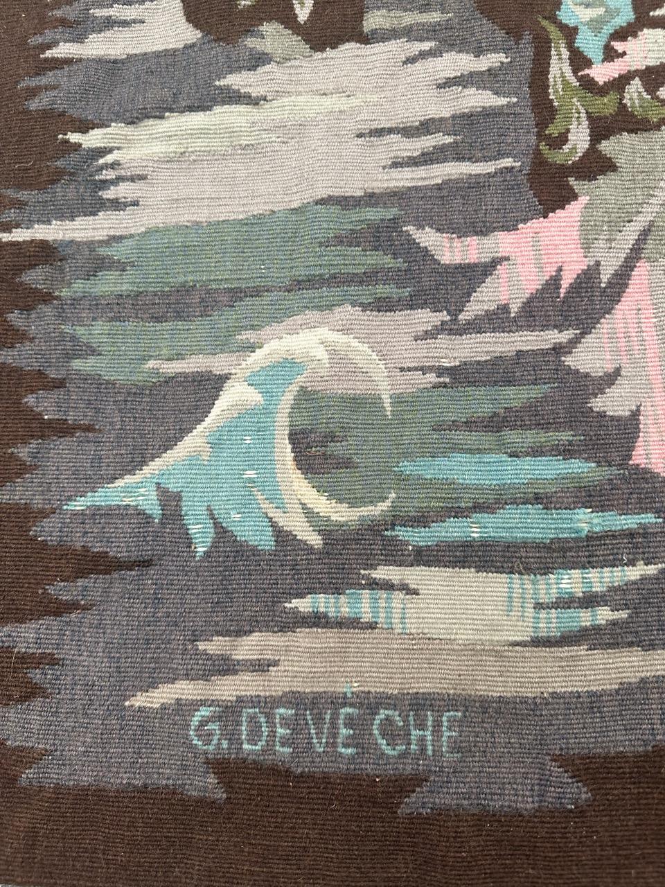 Very pretty mid century french Aubusson tapestry with beautiful design from the painter Georges Deveche ( 1903-1974), showing a scene with fish and underwater plants in stylized form. with brilliant colors. Entirely handwoven with wool on cotton
